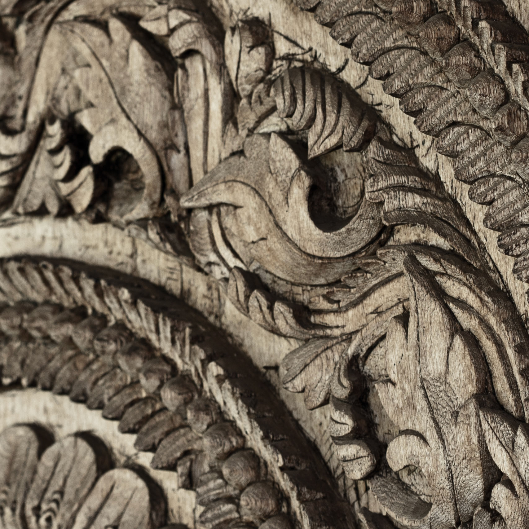 This is a close up shot to highlight the wood grain of a piece of art attached a wall at the Kauai Marriott.