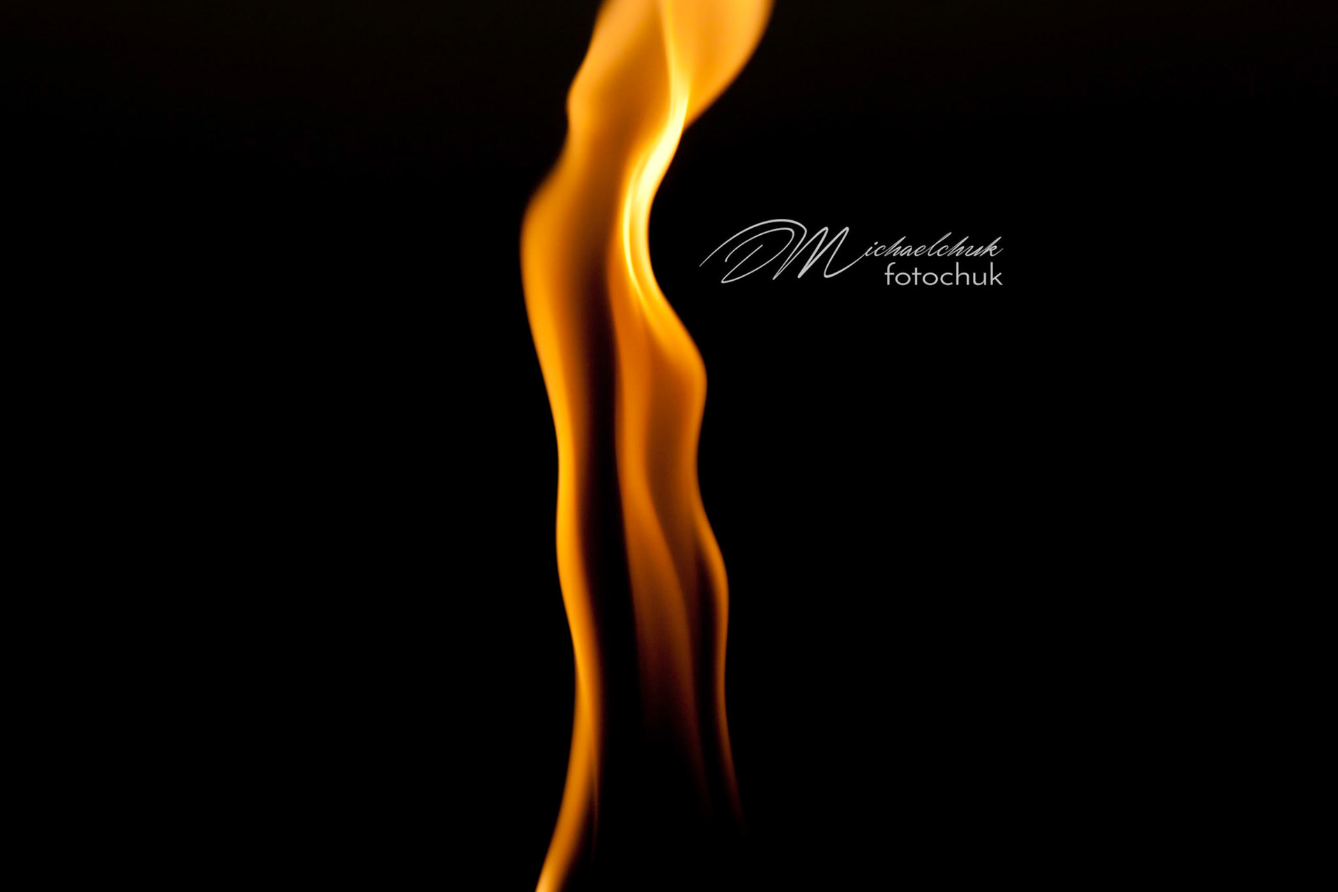 This is a close shot of a flame from a torch at the Beach House restaurant on Kauai.