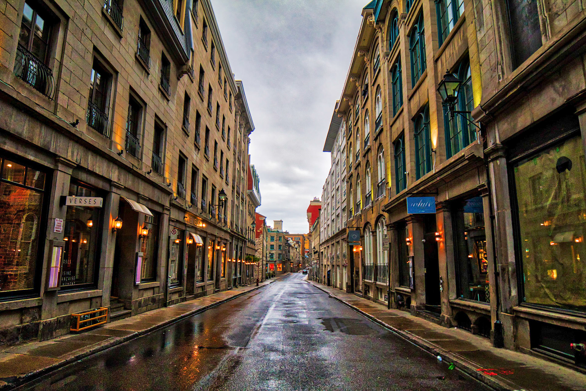 An early morning shot of the wet streets of Old Montreal.