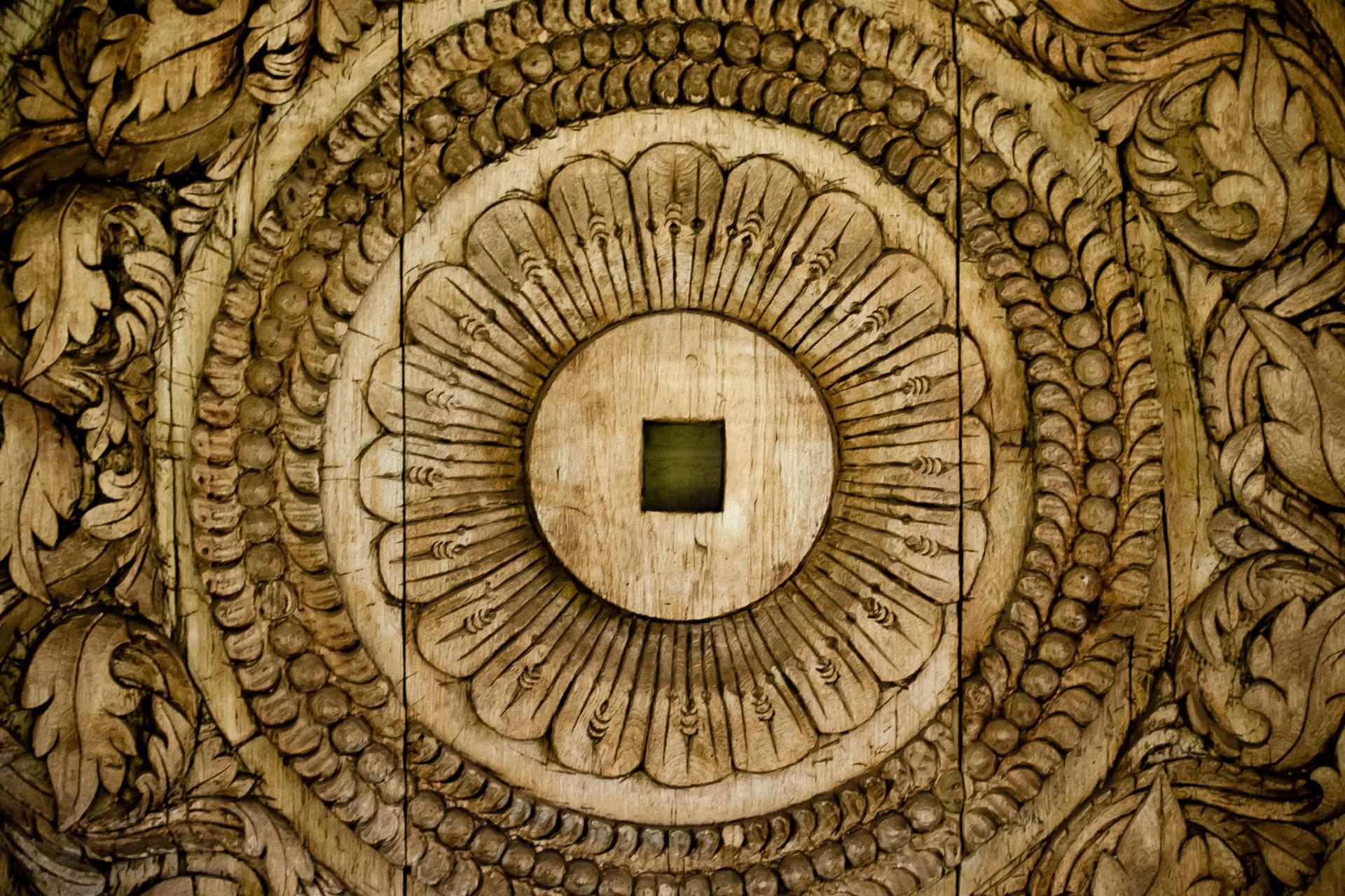 This was a decoratively carved piece of art attached a wall at the Kauai Marriott.