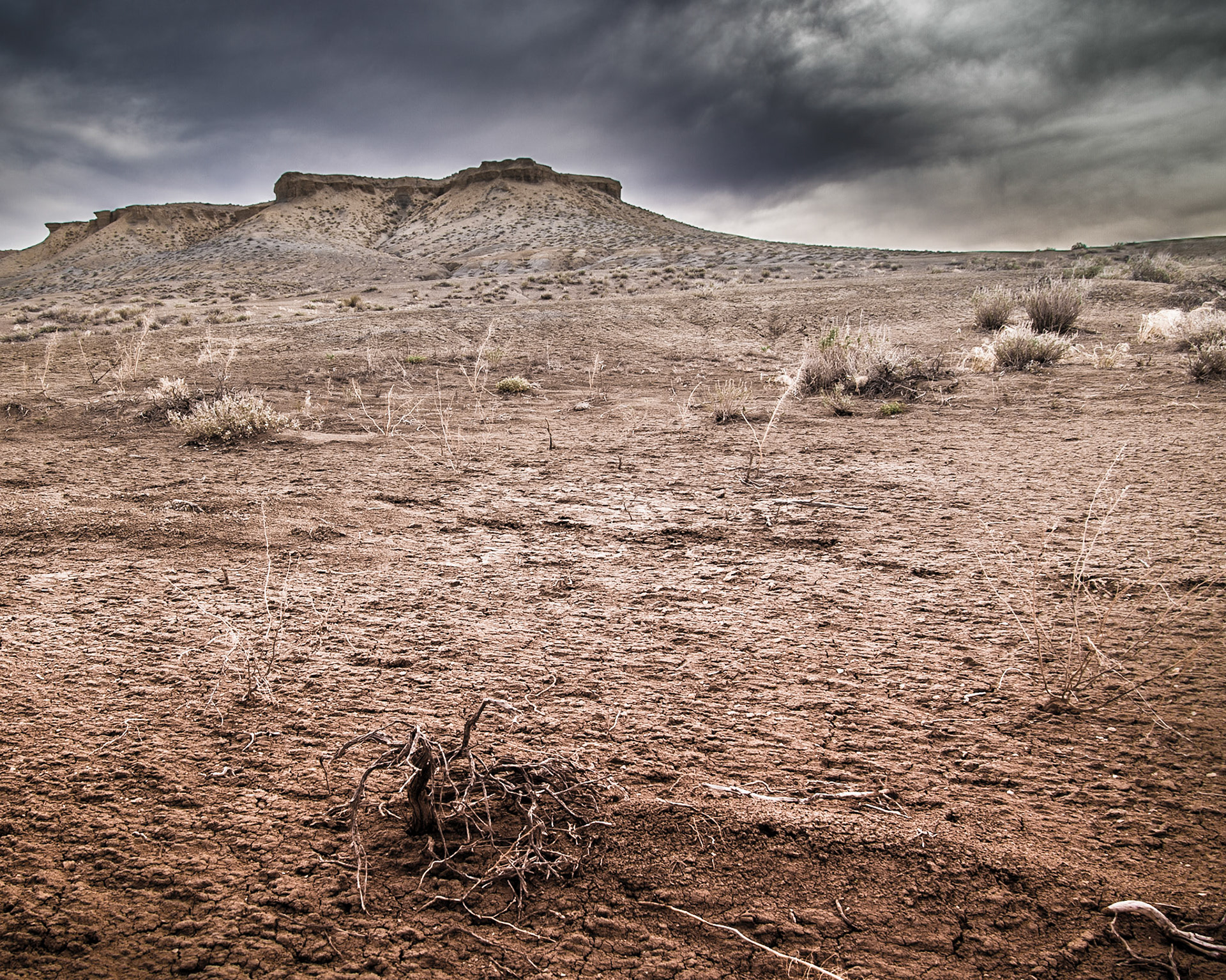 This is a monochrome shot near Coalmine Canyon in Arizona.  As a color image it was rather flat, but processed in color this time and it still looks gloomy.