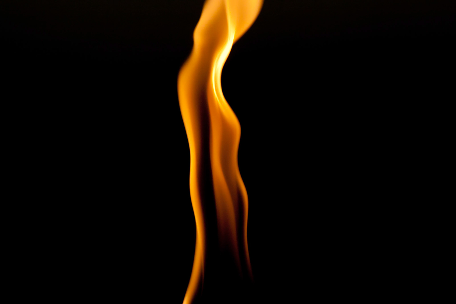 This is a close shot of a flame from a torch at the Beach House restaurant on Kauai.
