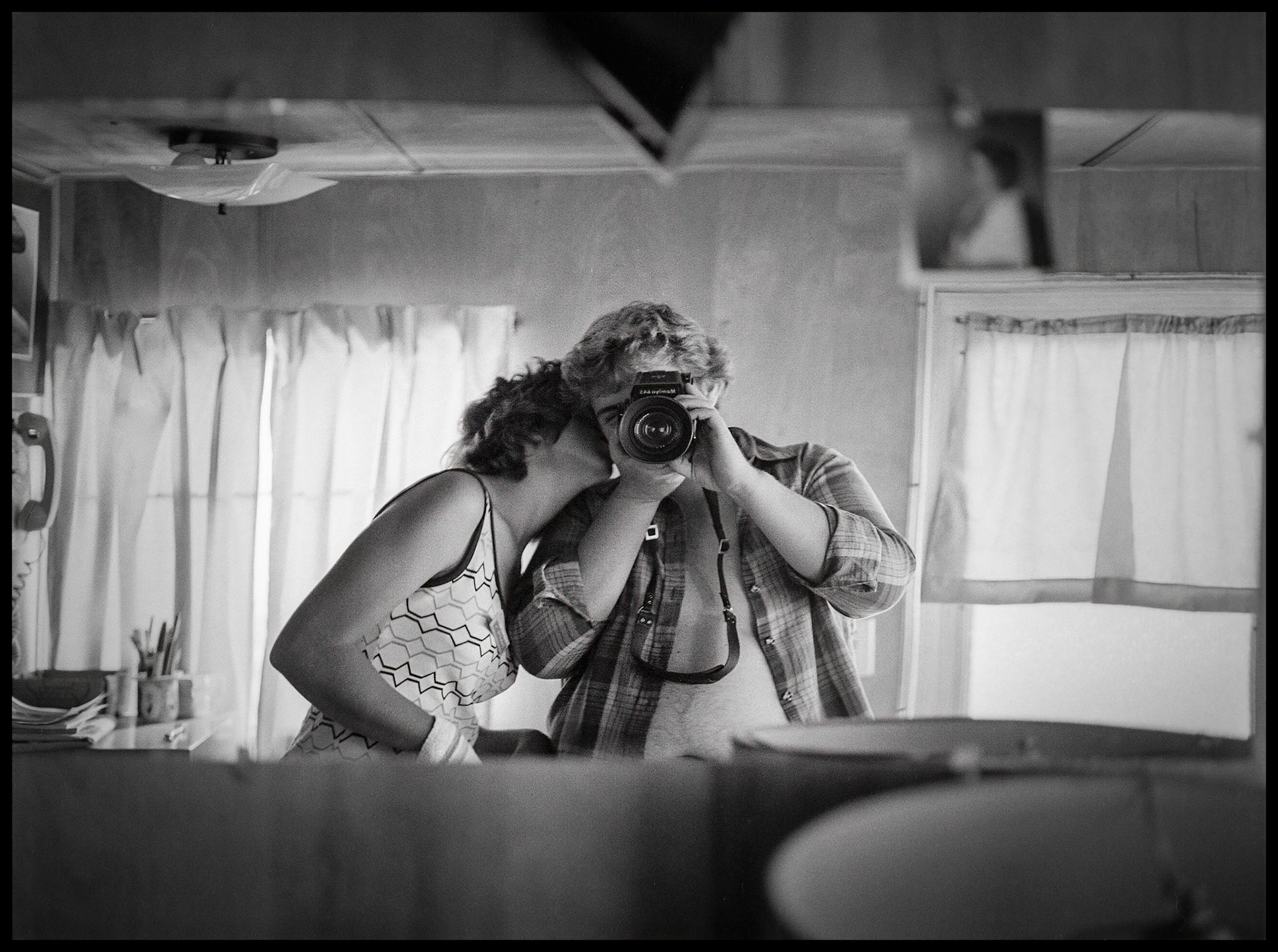 Curtis and Charlotte in their trailer in Downing Trailer Court, Kirksville, Missouri 1980 just before getting married.