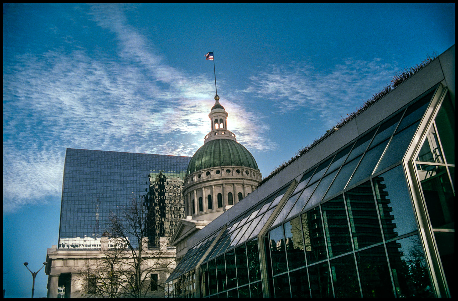 A dynamic perspective view of the U.S. flag on top of the old courthouse in downtown St. Louis, 1988. Part of a series shot one warm afternoon in November, 1988 called An Afternoon in St. Louis (a subset of my Industrial Geometry series).