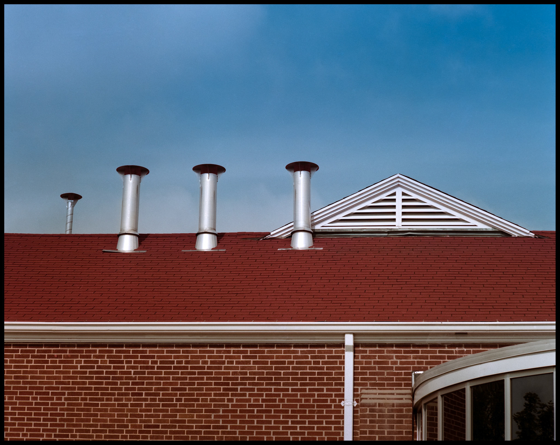 Air vents protruding from the roof of Macgruder Hall, Northeast Missouri State University (Since renamed Truman State University), Kirksville, Missouri, 1987