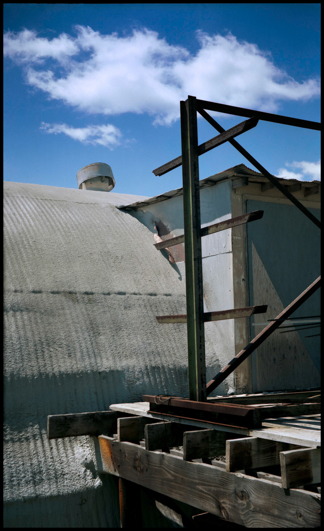 A steel beam and vent on the Koonse Glass building, downtown Columbia, Missouri 1990