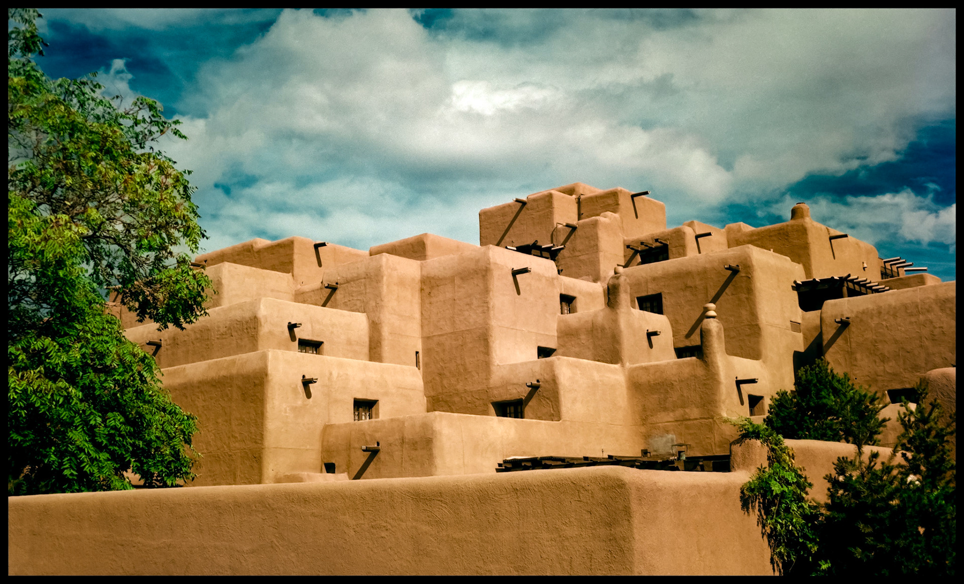 A vintage view of an Adobe building which houses the Inn and Spa at Loretto in Santa Fe, New Mexico USA 1993