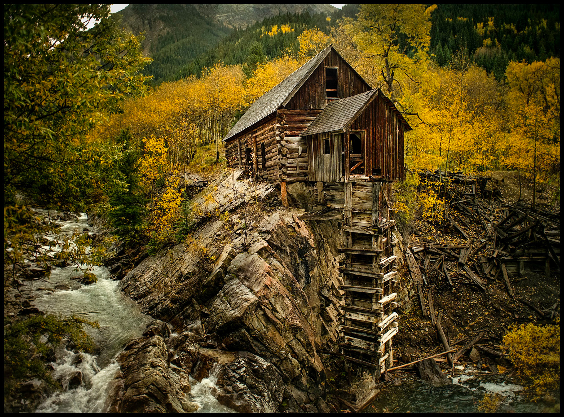 Historic Crystal Mill surrounded by colorful Autumn Apsen trees at the historic town of Crystal near Marble Colorado. 1992