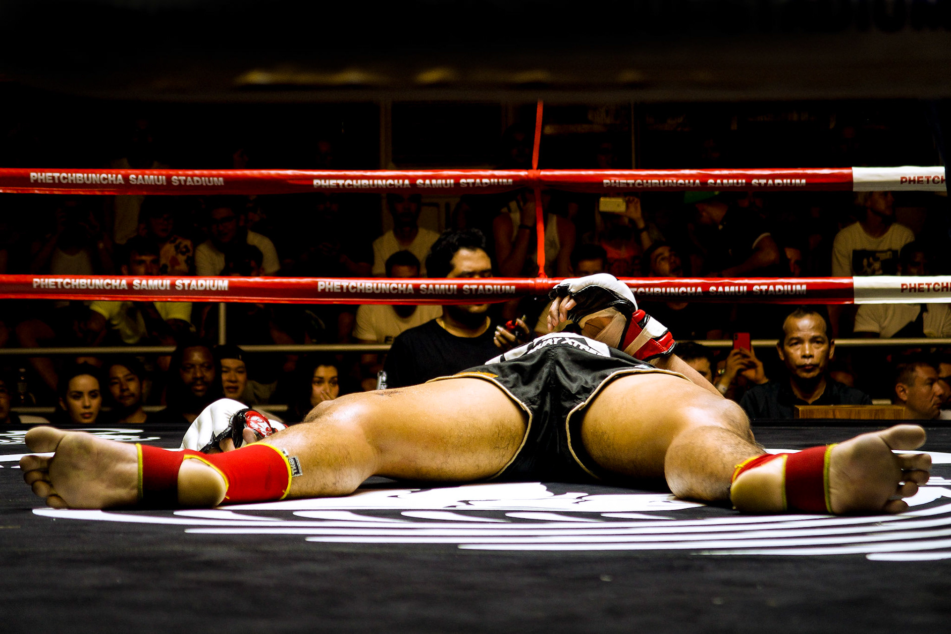 A fighter after being knocked out – Samui International Muay Thai Stadium, Koh Samui, Thailand