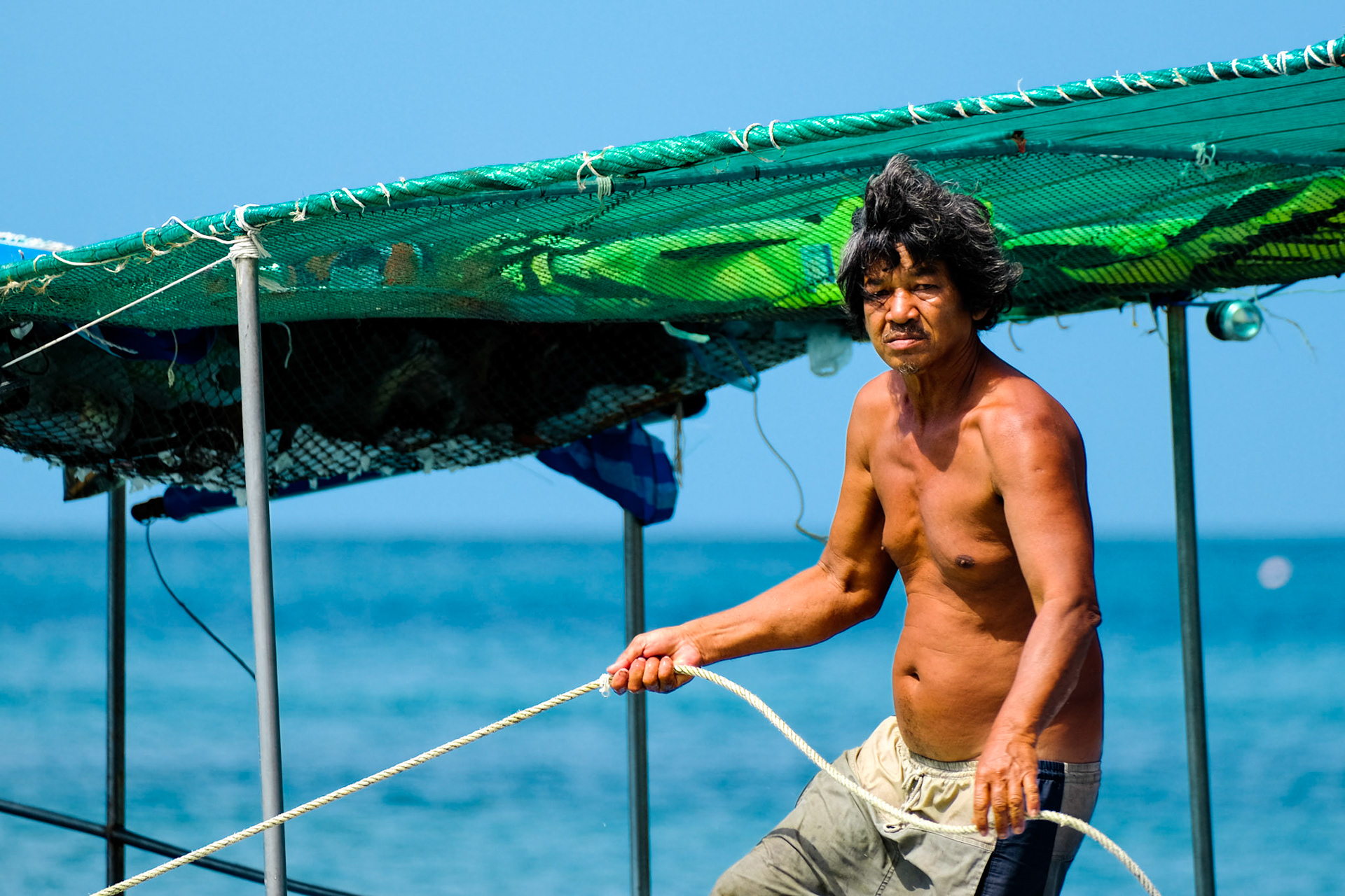 General view of a fisherman – Sairee Beach, Ko Tao, Thailand