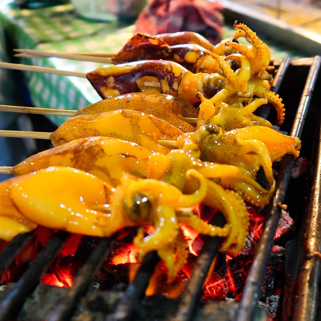 Squid on the grill at a market – Krabi, Thailand