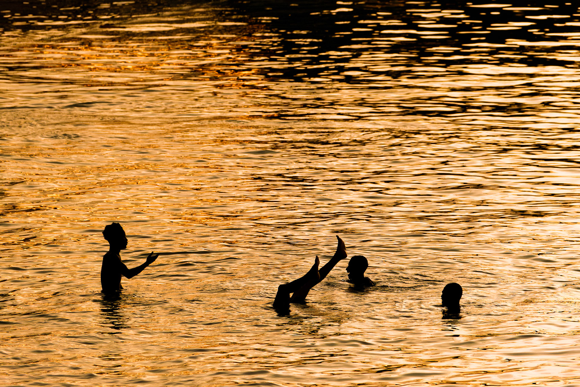 Kids playing in the sea – Stone Town, Zanzibar, Tanzania