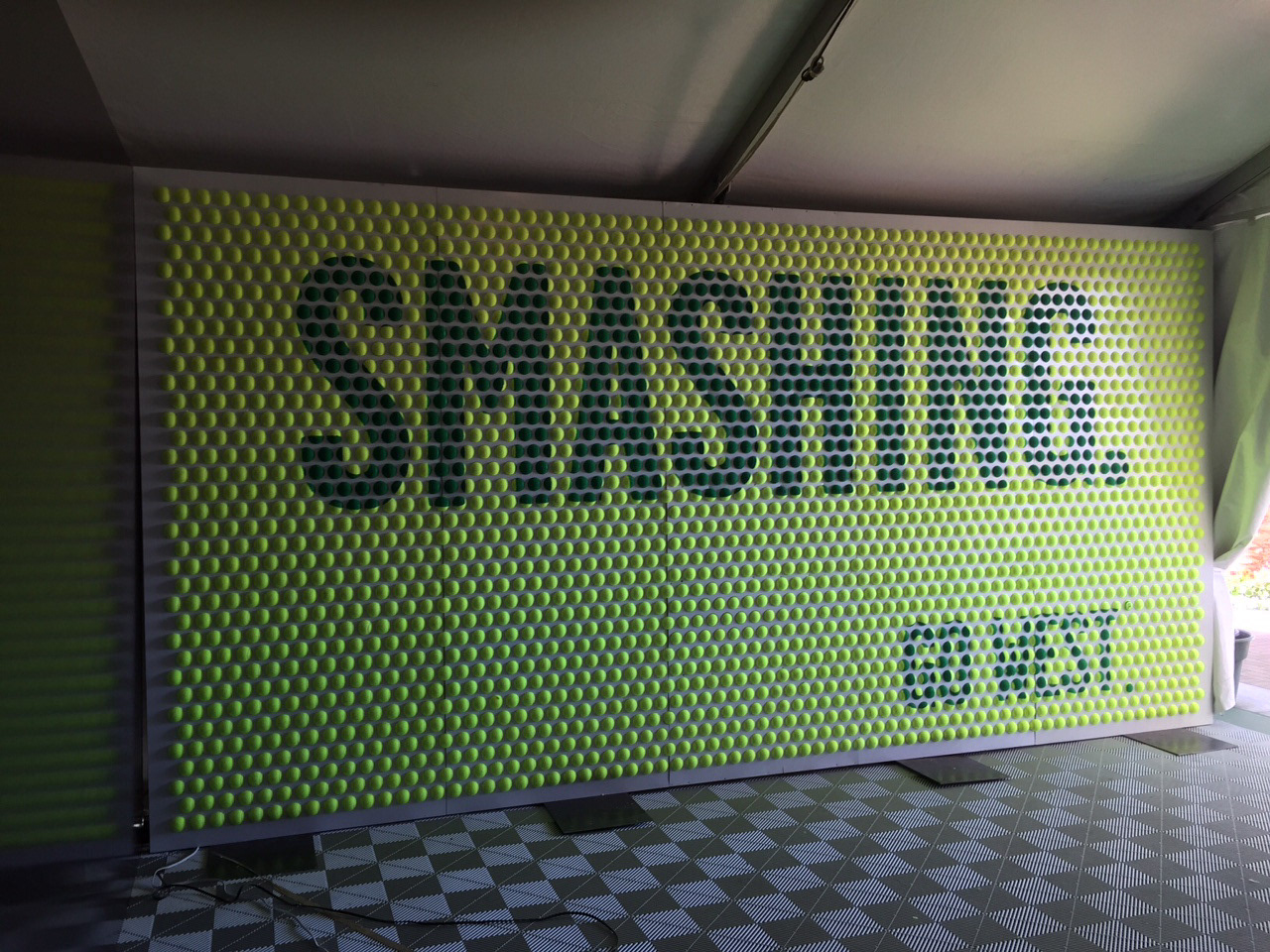 Smashing Tennis Ball Sign