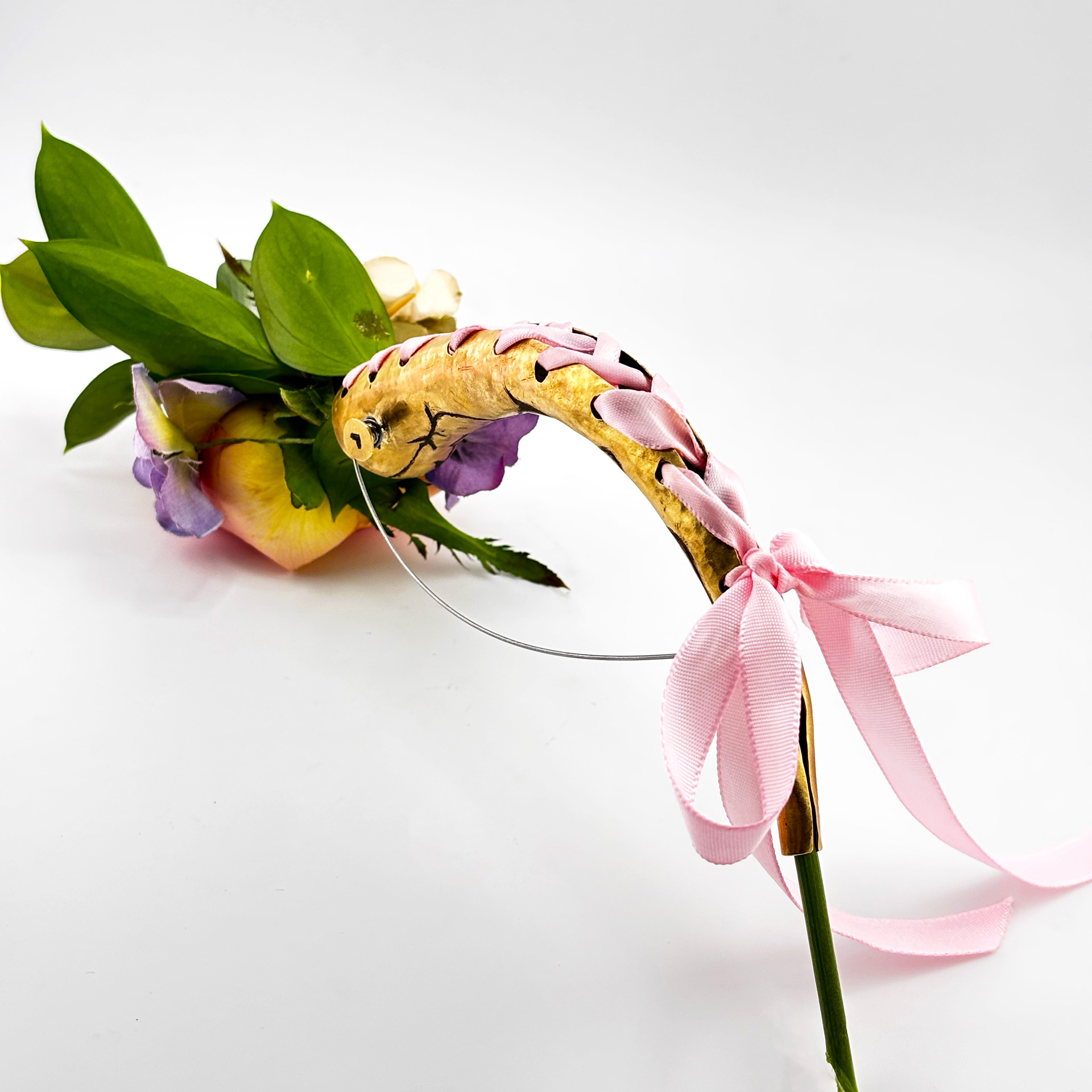 Bloomed Resistance, Brass and Found Objects, 2 x 4 x 8", 2025