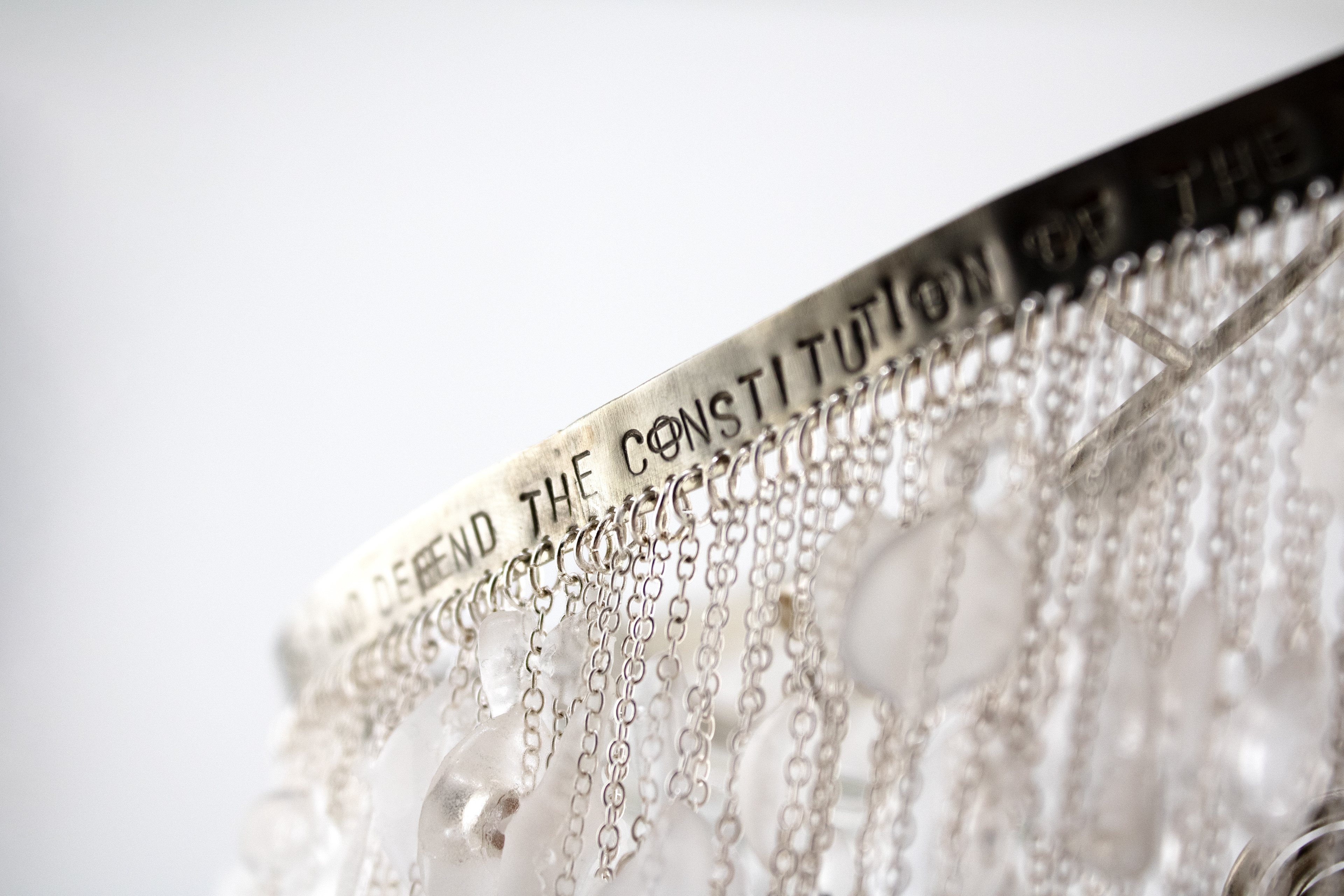 ICE Melts (Detail), 2026, Nickel, Resin, and Gemstones, 3.94” x 8.66” x 9.05”