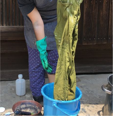 The dye is bright green at the beginning.