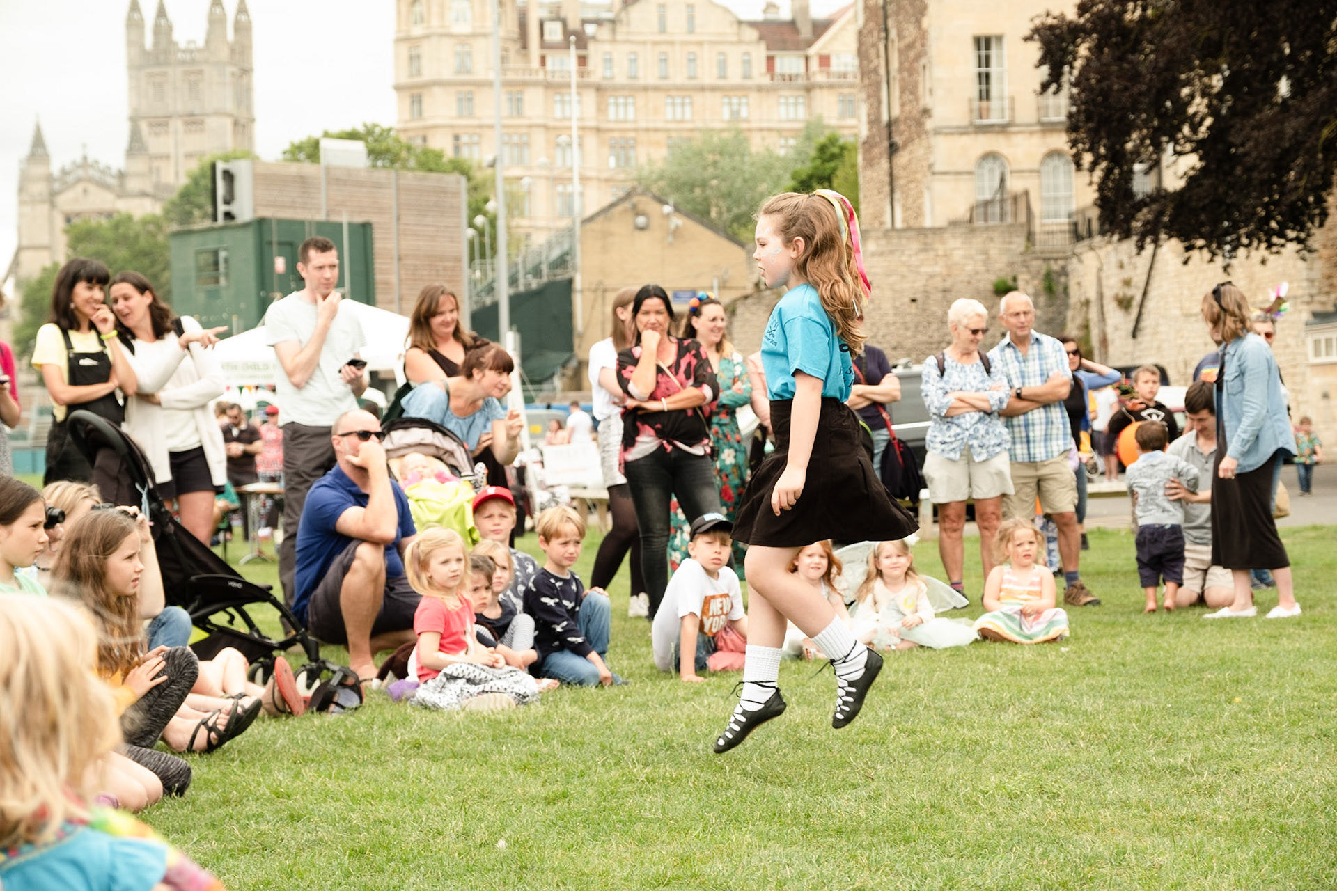 Pictured: Gracie from Hills School of Dance entertains a young audience at the The Recreation Ground, as part of the 2019 Bath Carnival, Saturday 13th of July, Bath, UK