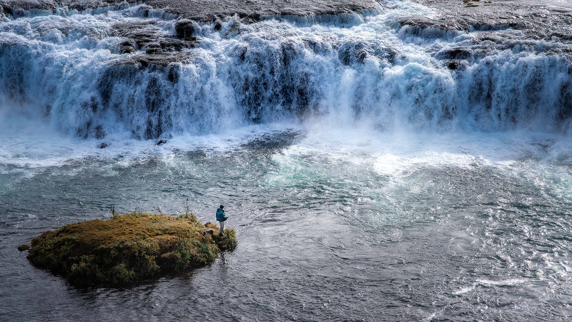 The Fisherman and the Salmon Ladder - Lone Figure Before Faxi Waterfall, South Iceland