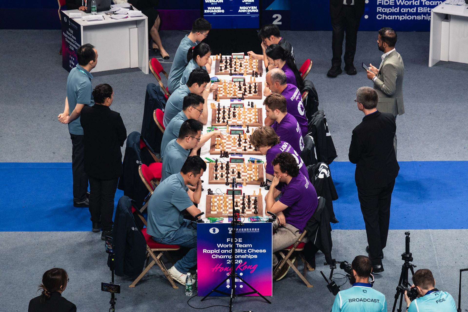 HONG KONG, China - JUNE 21: Players of Endgame.AI compete with Dragon Chilling during the Rapid group finals of FIDE World Team Rapid and Blitz Chess Championships 2026 at Queen Elizabeth Stadium on June 21, 2026 in Hong Kong, China, (Photo by Jack Ng/Alamy Live News)