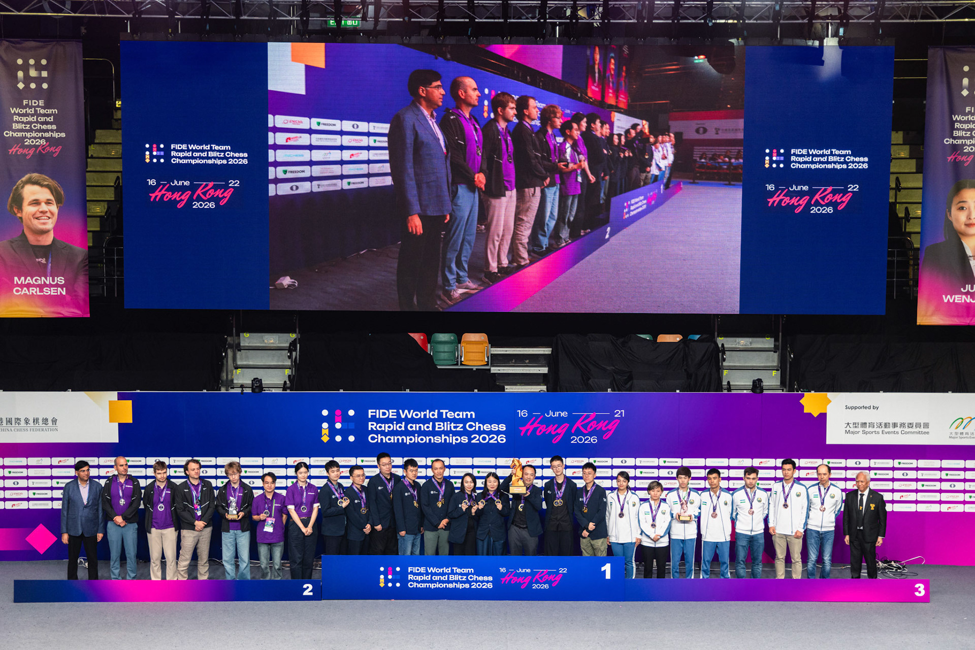 HONG KONG, China - JUNE 21: Winners of the Blitz group pose a group photo during the closing ceremony of FIDE World Team Rapid and Blitz Chess Championships 2026 at Queen Elizabeth Stadium on June 21, 2026 in Hong Kong, China, (Photo by Jack Ng/Alamy Live News)