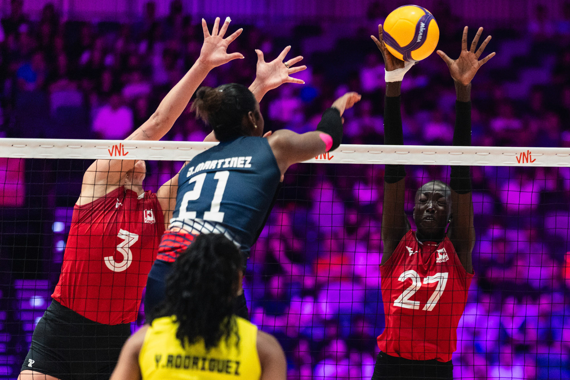 HONG KONG, China - JULY  12: Nyadholi Thokbuom (No. 27) of Canada blocks an opponent attack during Volleyball Nations League Hong Kong 2026 at Kai Tak Arena on July 12, 2026 in Hong Kong, China, (Photo by Jack Ng/Pixel Images Hong Kong)