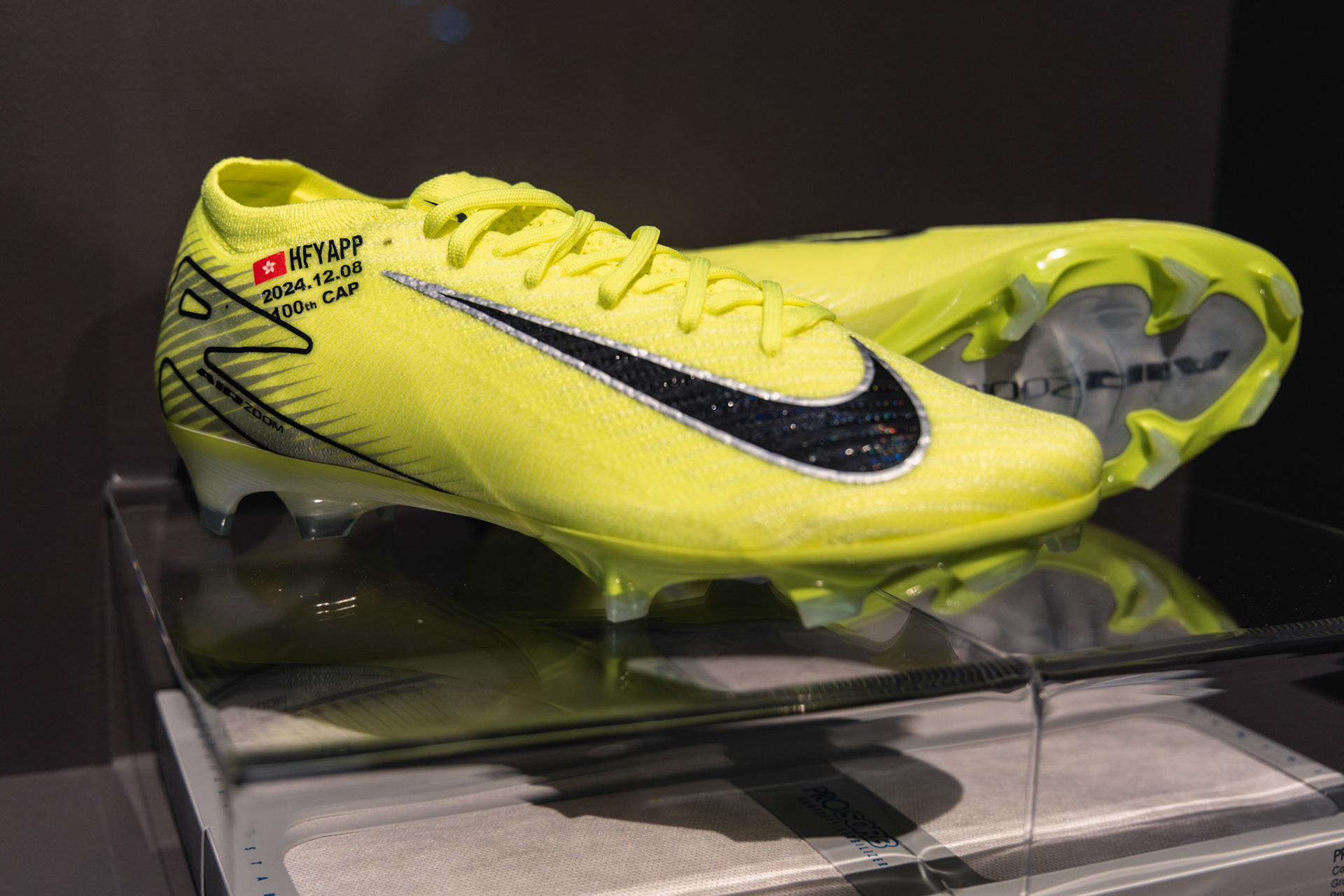 HONG KONG, China - MAY 28: The Grand Opening of FIFA Museum in Hong Kong shows a match worn boots by Yapp Hung Fai, the captain and goalkeeper of Hong Kong, China to celebrates his 100th national team apprearances at FIFA Museum Hong Kong, Causeway Bay on May 28, 2026 in Hong Kong, China, (Photo by Jack Ng/Alamy Live News)
