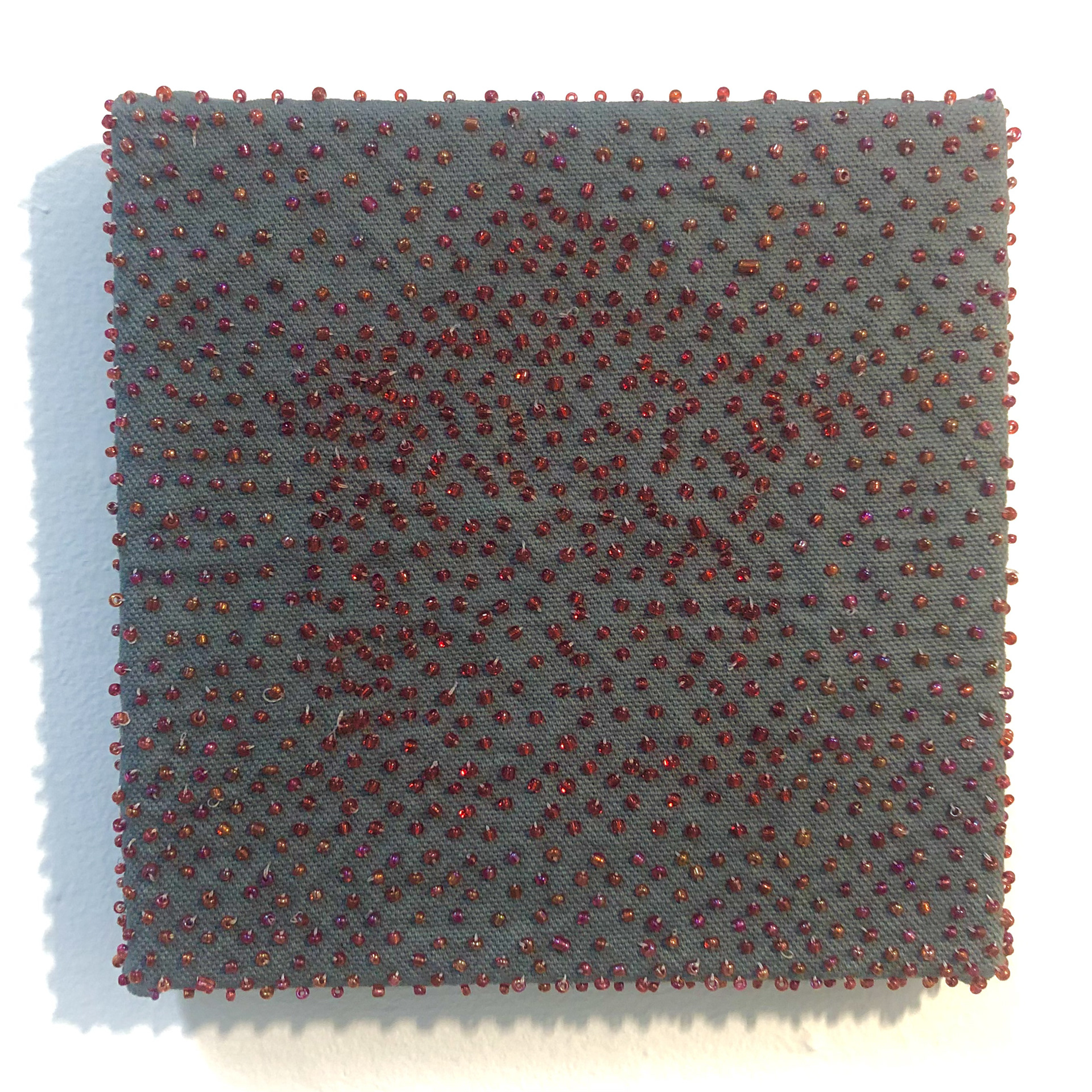 "First Snow" (6" x 6" glass beads and thread on dyed canvas)