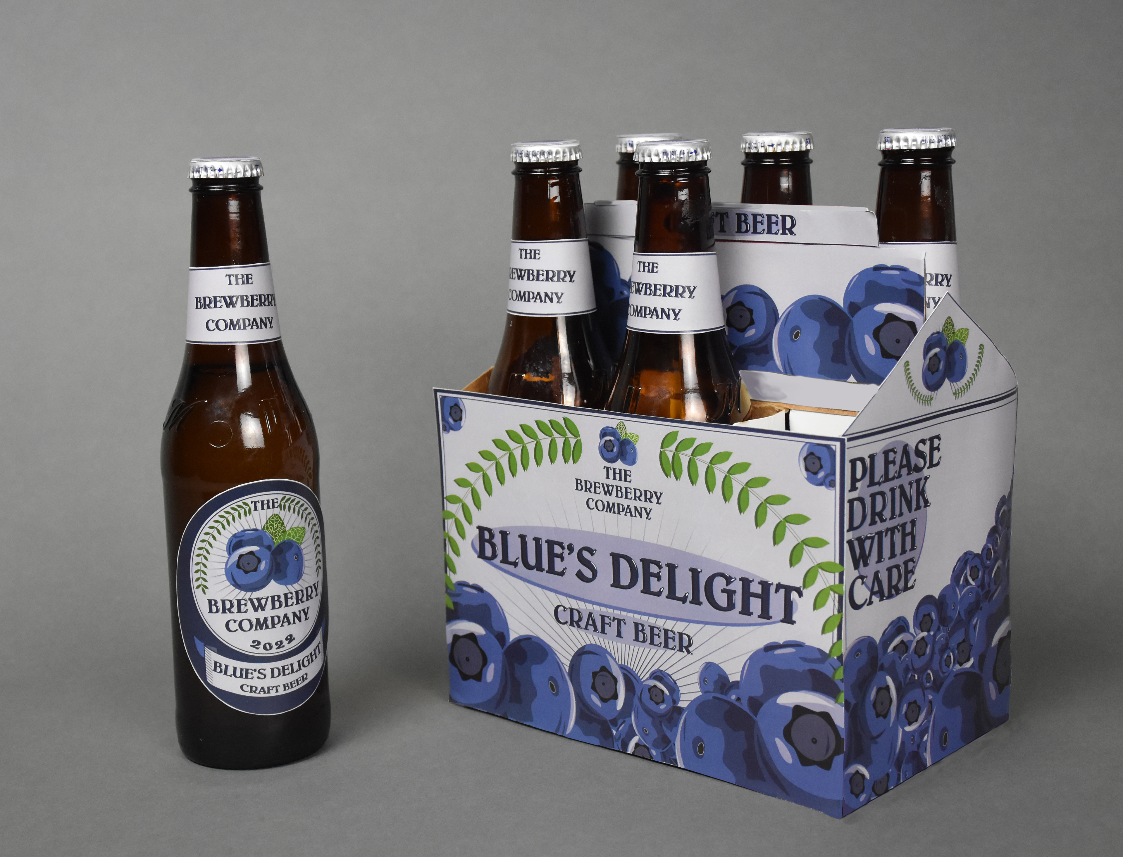 Assembled Beer bottles with 6 pack, labels, neck pieces, and bottle caps.