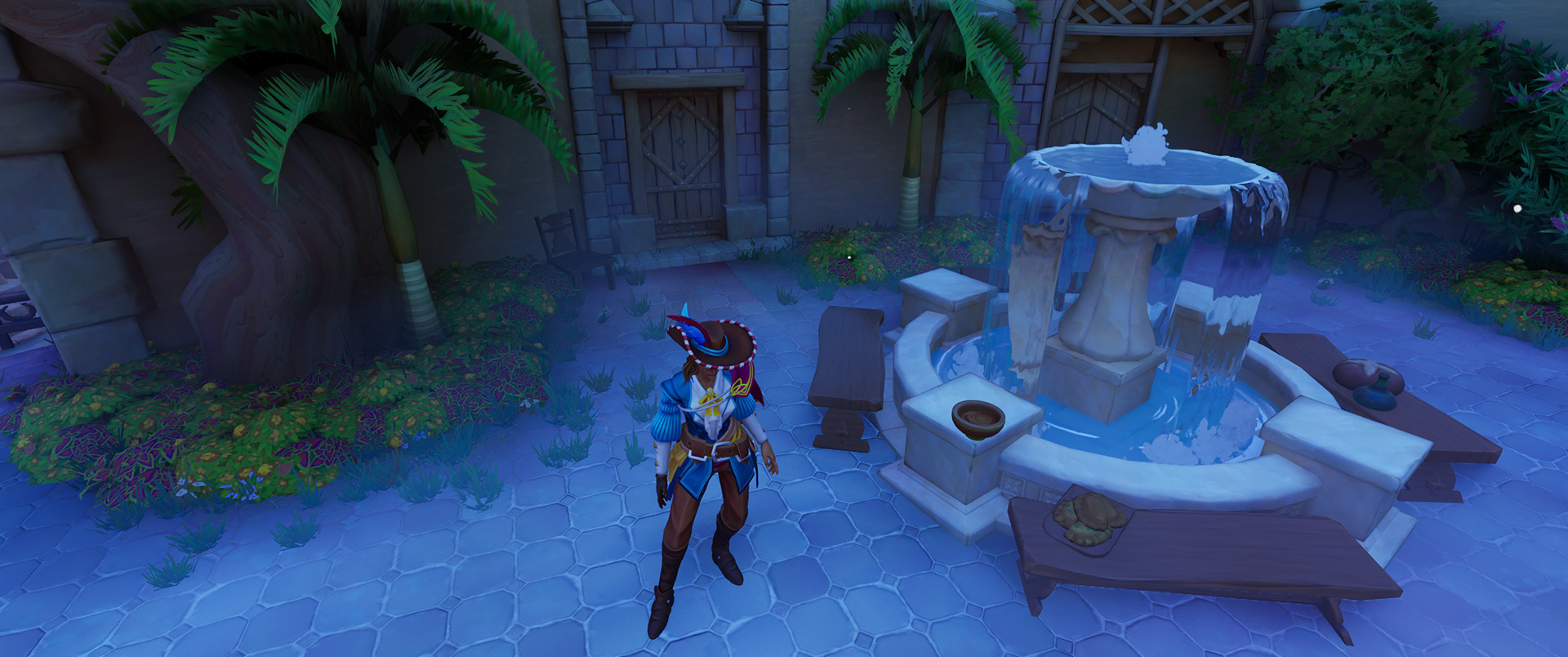 Fountain and flowerbed.