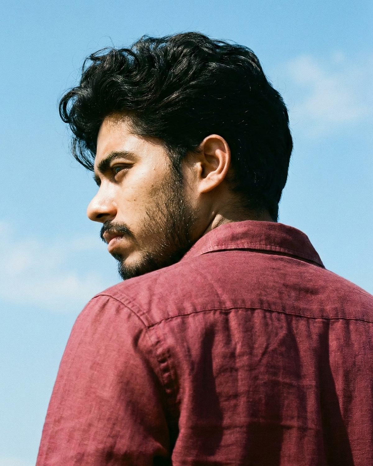 a photo of rafsan hossain who is a graphic designer and visual artist from bangladesh. who is known for his work in branding, packaging, publications, digital design, and UI/UX.