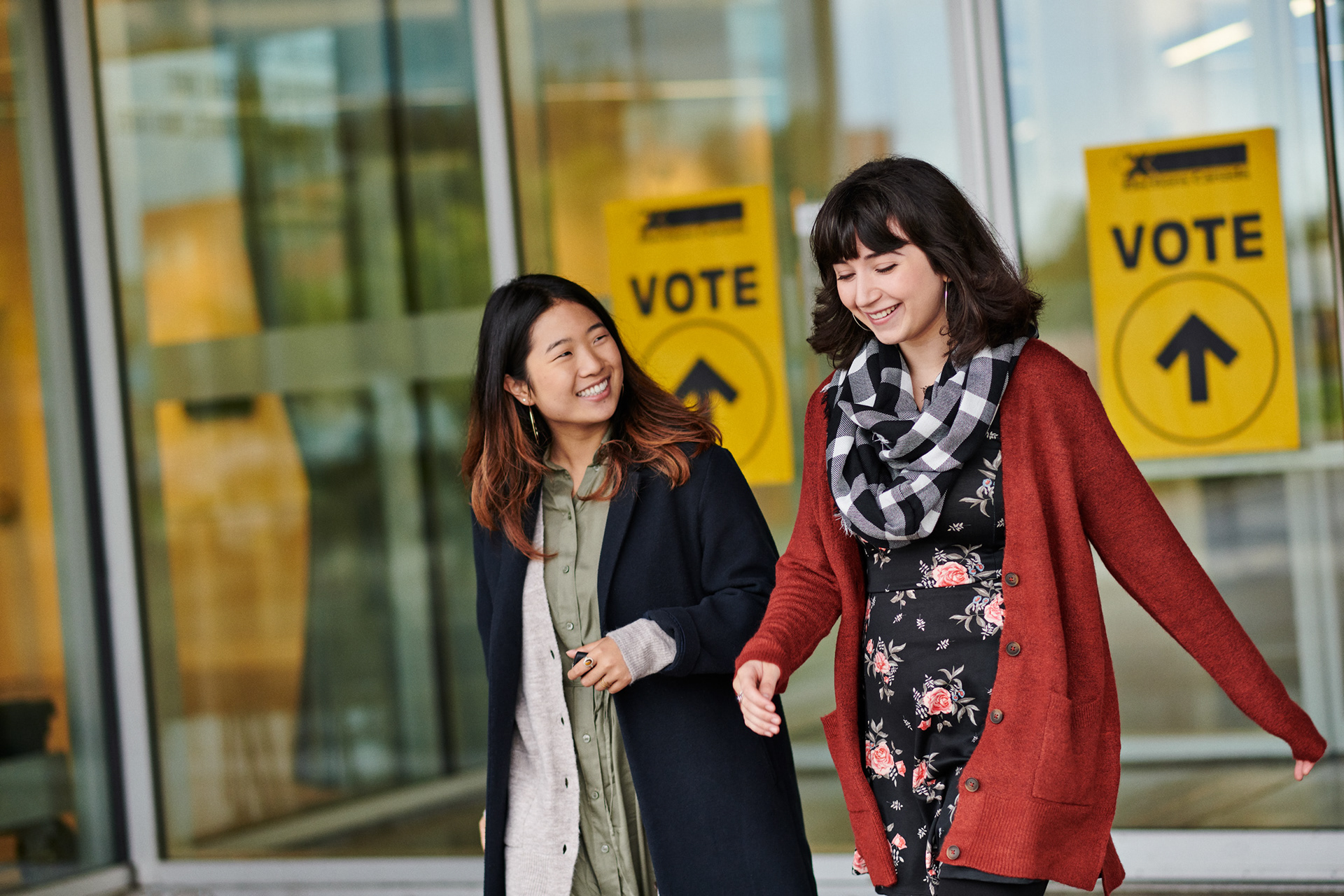 young adult females share a laugh after voting