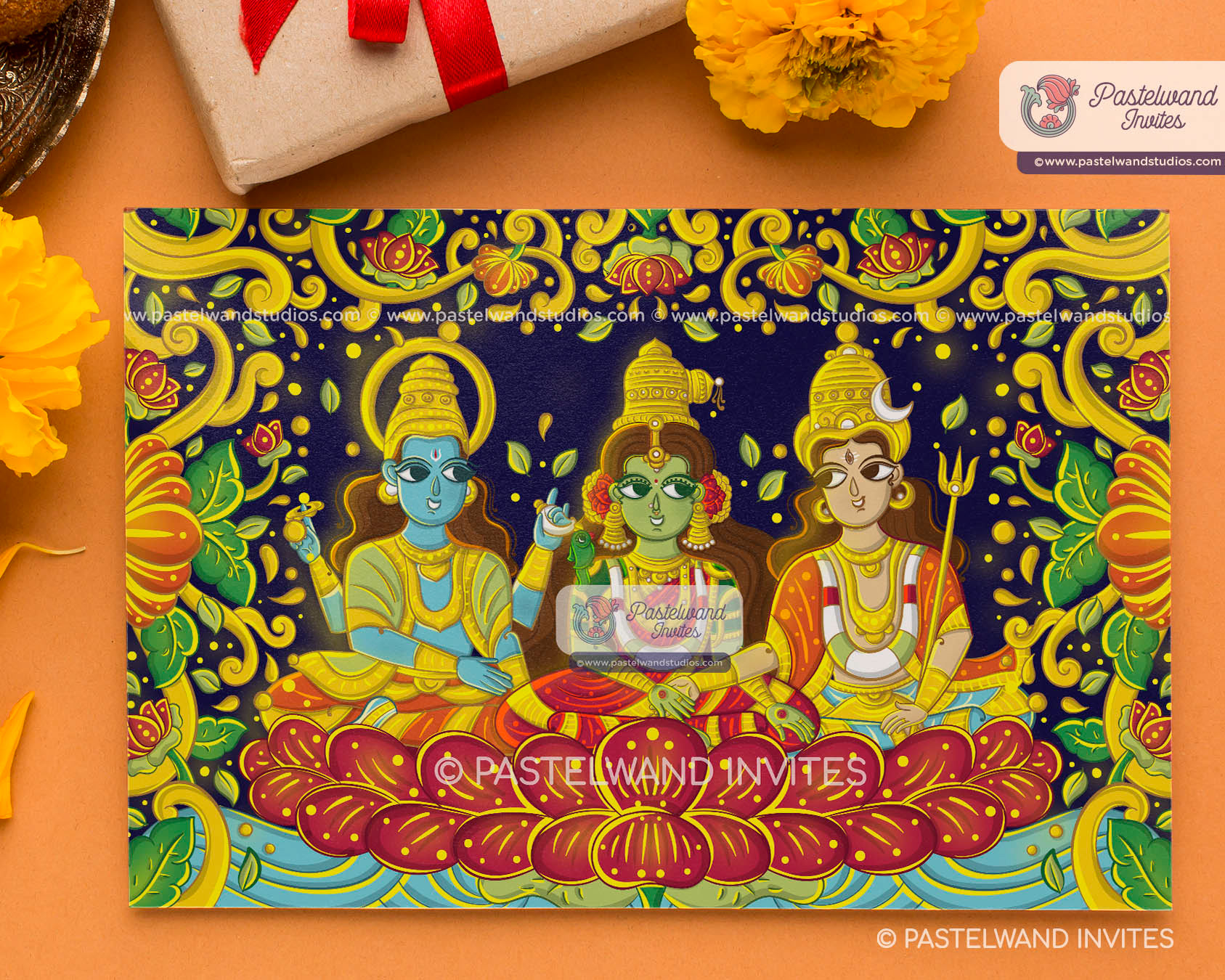Quirky Shiva Parvati's one-of-a-kind Madurai wedding as Meenakshi Sundareshwarar, a unique wedding invitation with bright, vivid colours