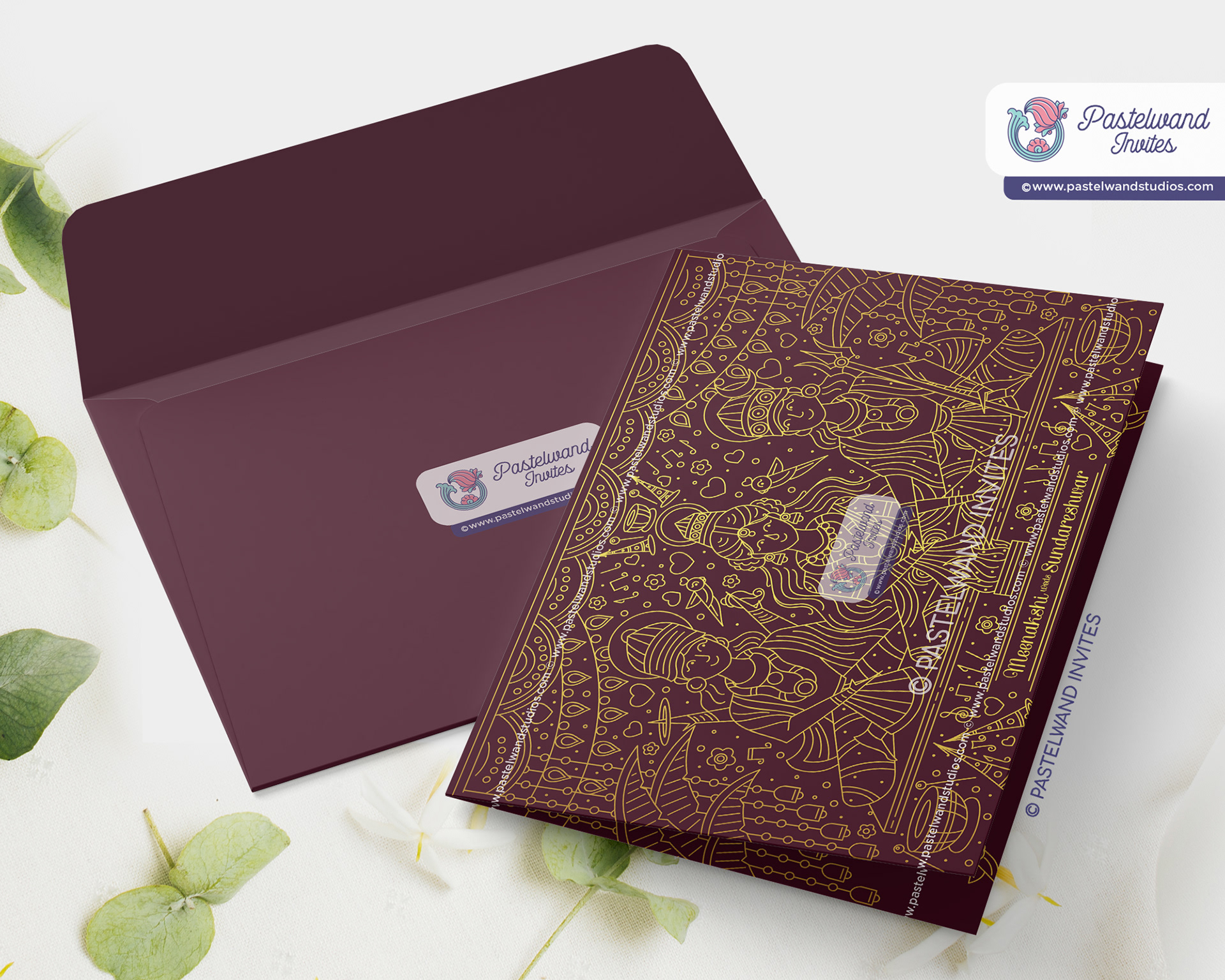 Grand and luxurious gold foil Indian wedding invitation depicting Meenakshi's Thirukalyanam, also known as the Madurai Wedding.