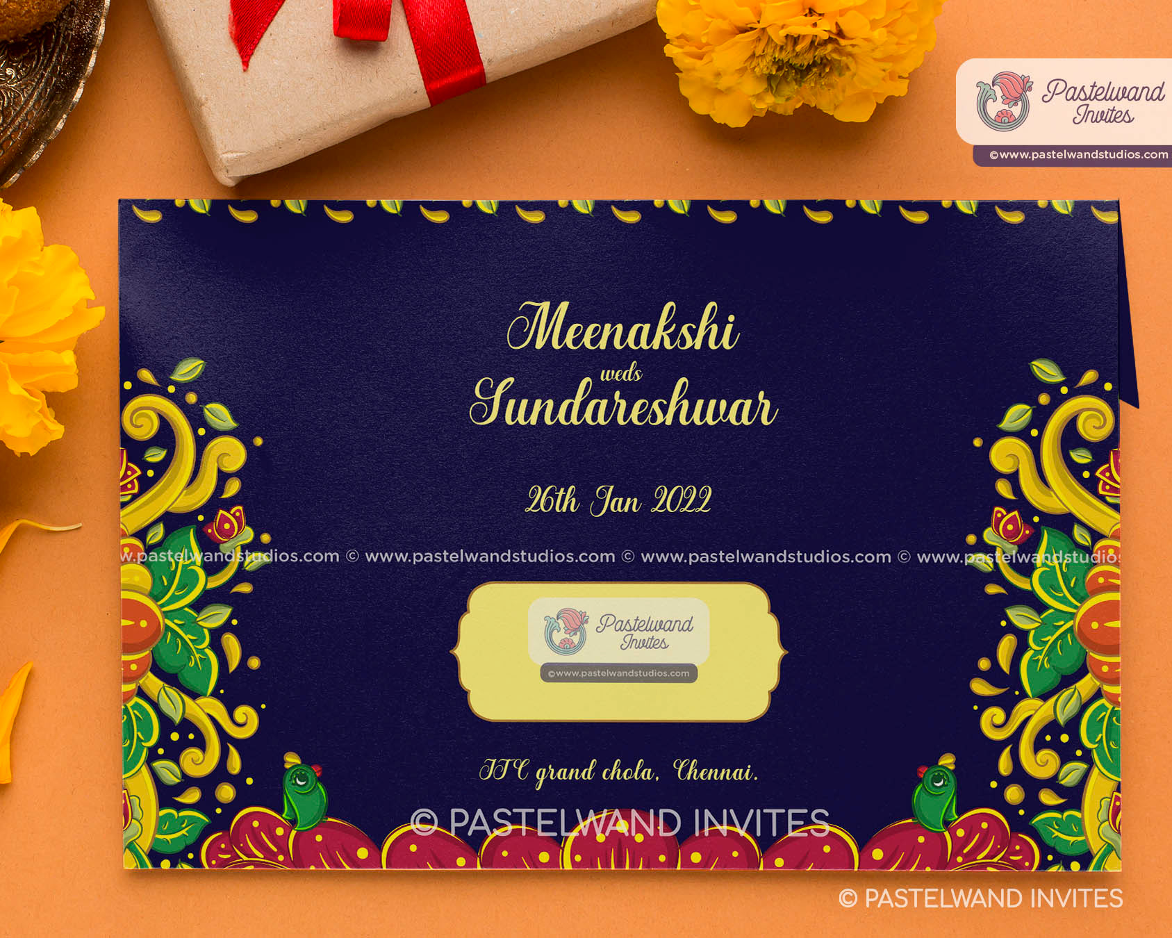 Quirky Shiva Parvati's one-of-a-kind Madurai wedding as Meenakshi Sundareshwarar, a unique wedding invitation with bright, vivid colours