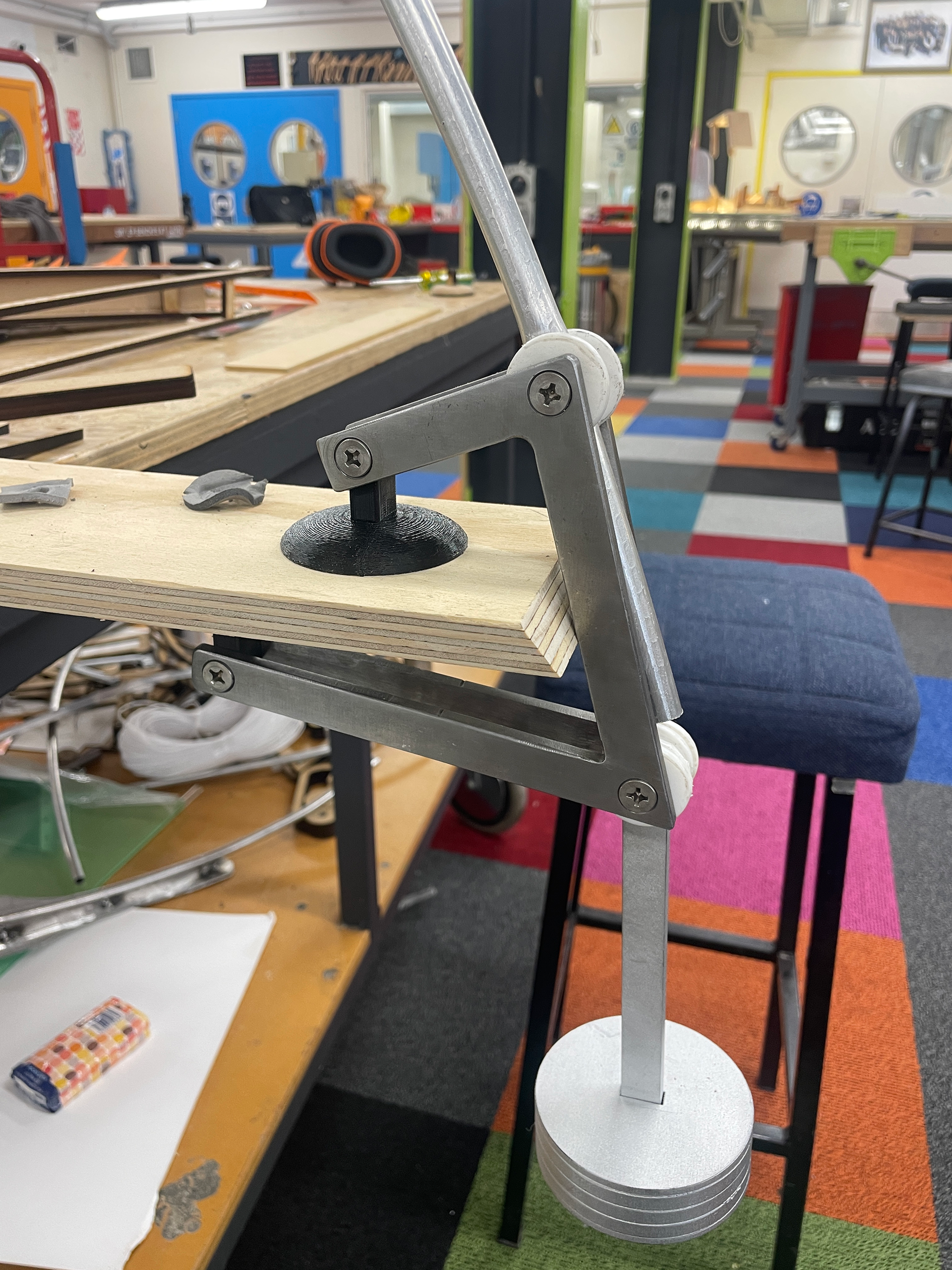Water jet cut 6mm steel clamp pieces, 3d printed feet