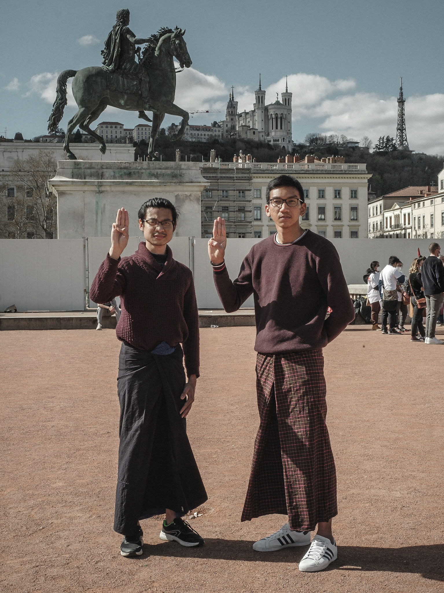 Lyon, France 2021/03/27. After the coup by the military junta in Myanmar, overthrowing Aung San Suu Kyi, the french burmese community organised rallies in Paris, Lyon and Pau. Series of portraits of Burmese doing the three fingers sign, sign of resistance in support the the protests in Burma.  Photography by Maxime Gruss.Lyon, France 2021/03/27. Apres le coup d Etat de la junte militaire au Myanmar, qui a renverse Aung San Suu Kyi, la communaute birmane francaise a organise des rassemblements a Paris, Lyon et a Pau. Serie de portraits de Birmans faisant le signe des trois doigts, signe de resistance en soutien aux protestations en Birmanie. Photographie de Maxime Gruss.