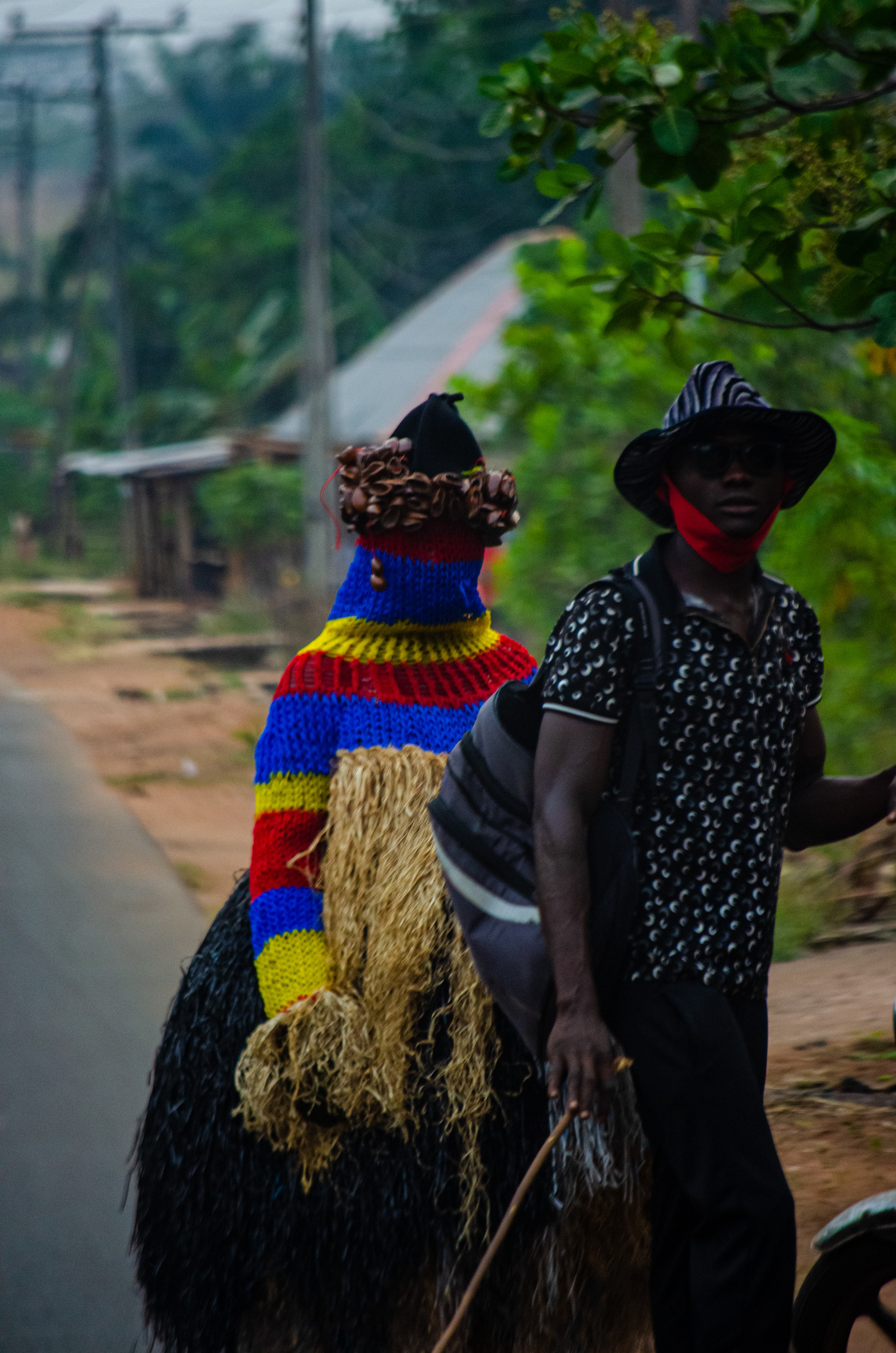 This is my favorite picture of masquerades that I acquired on my trip. Everything from the mood to the vibrance of this image makes it that memorable to me.