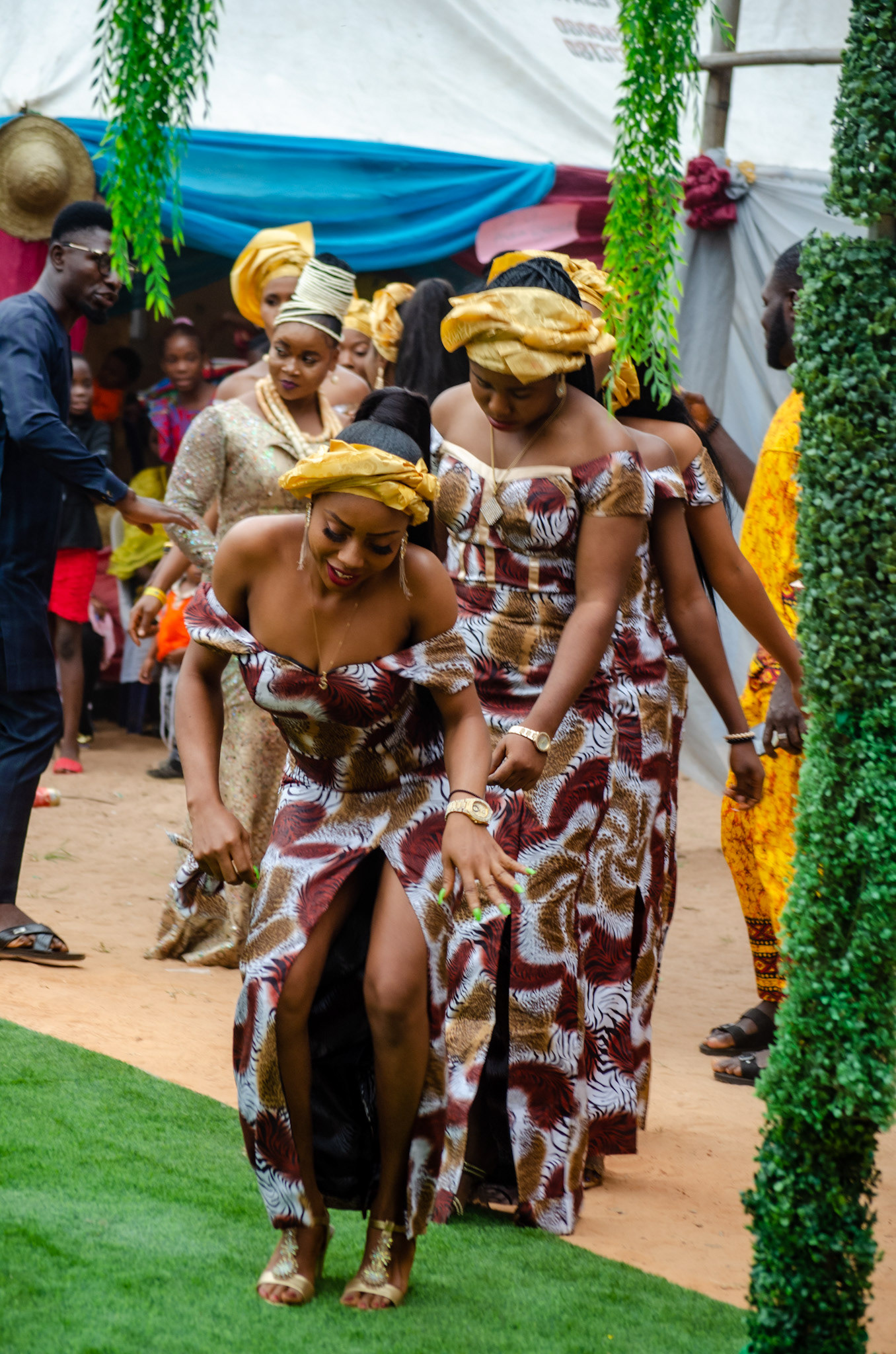 The first dance to show the bride and the bridesmaids. Also to carry a cup of palmwine and find her bride in the crowd.