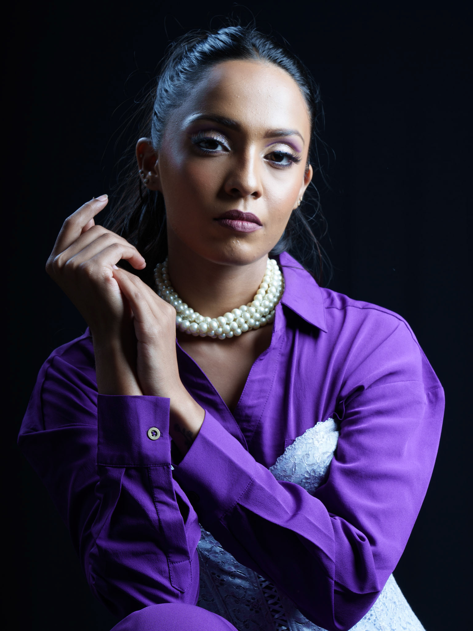 vizora-studio-closeup-purple-shirt-pearls