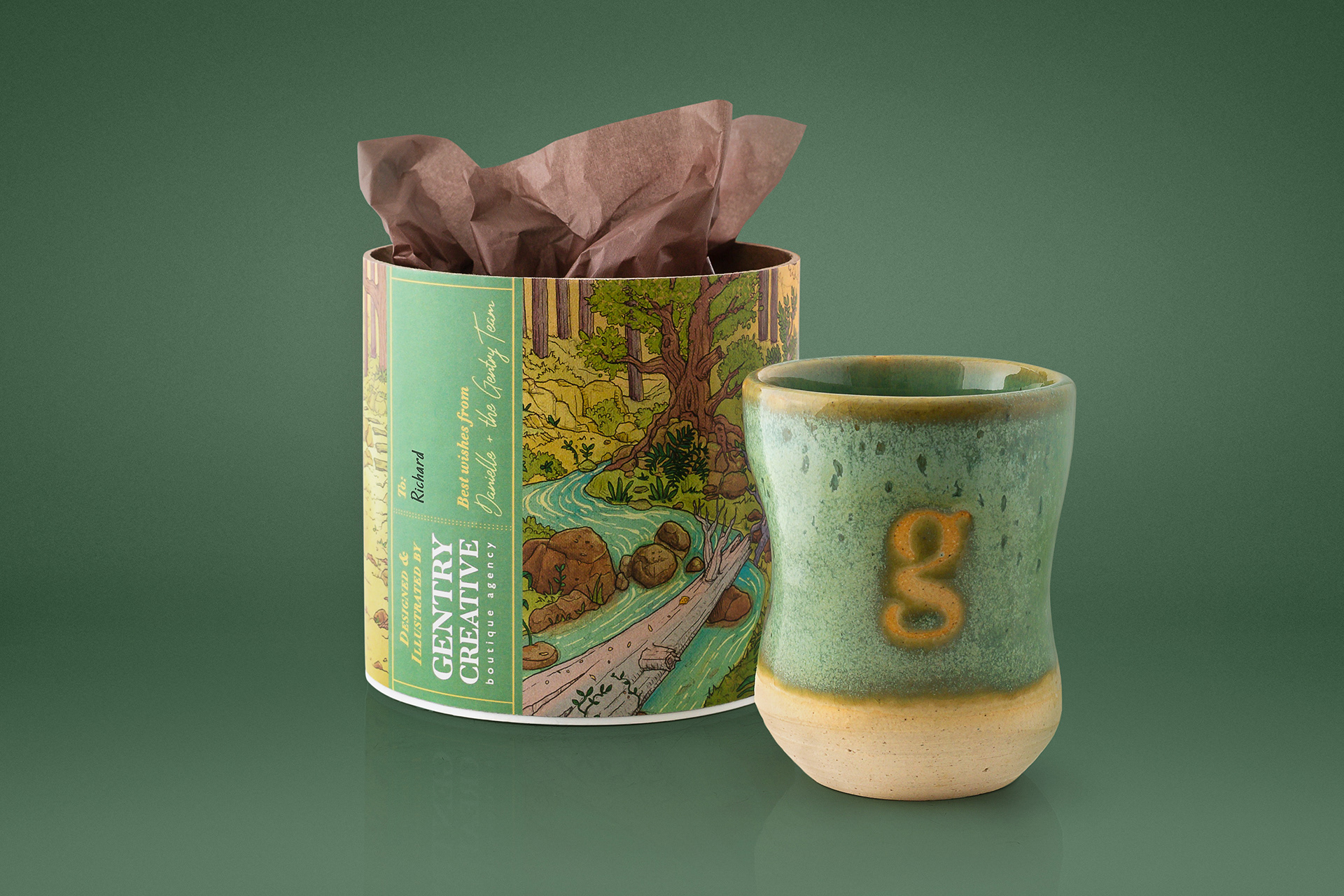 Handmade branded glazed ceramic cup with illustrated tube packaging design for client gift
