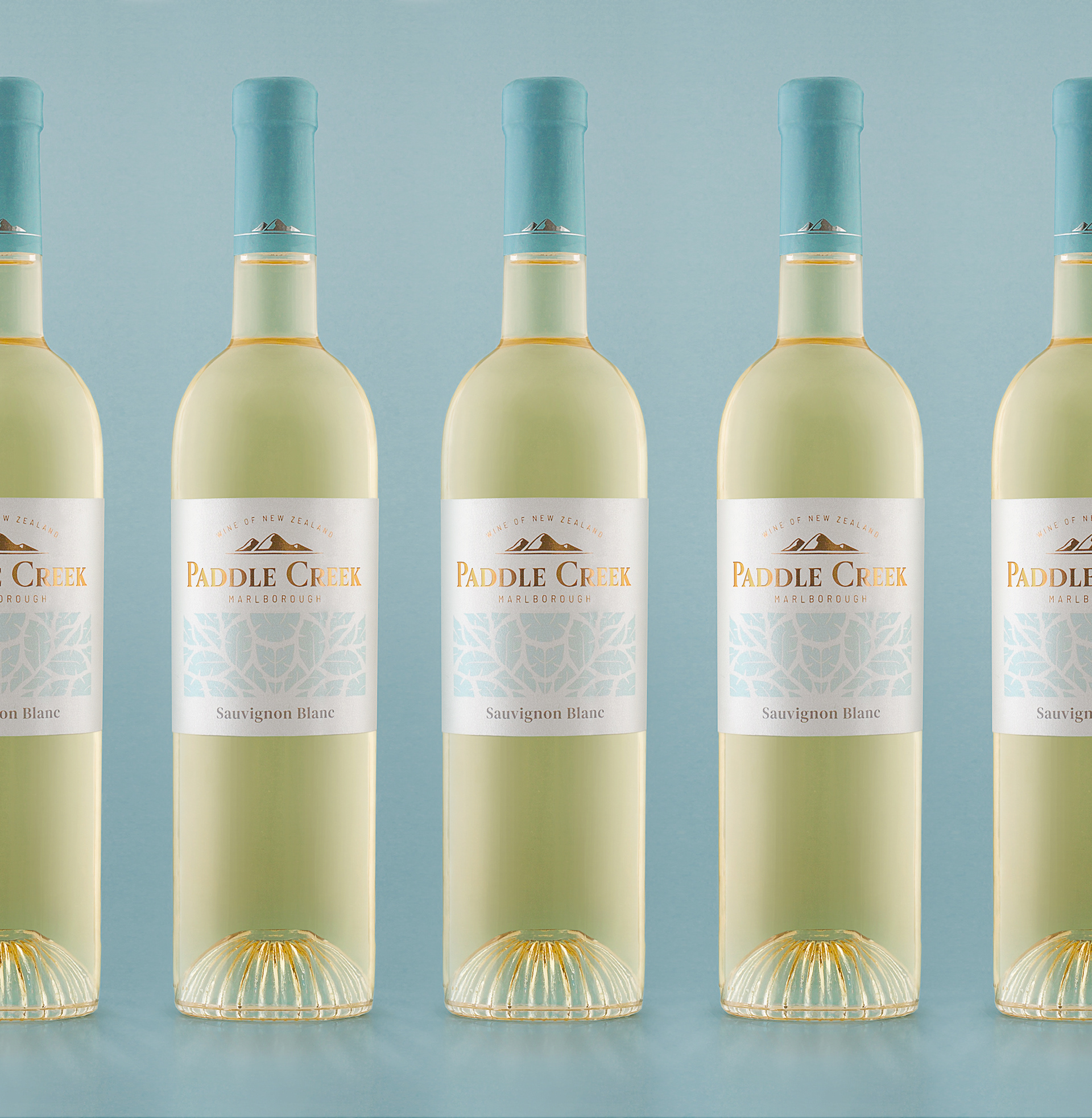 Paddle Creek wine label design lined up bottles