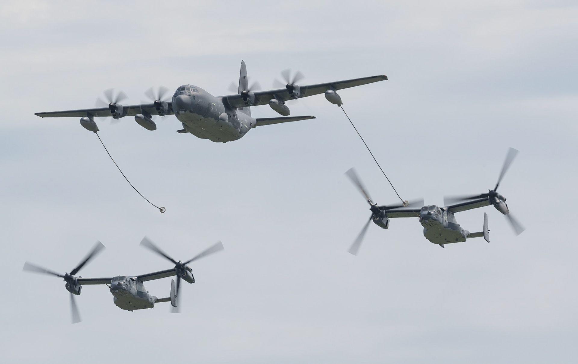 C-130J refueling V-22 Ospreys