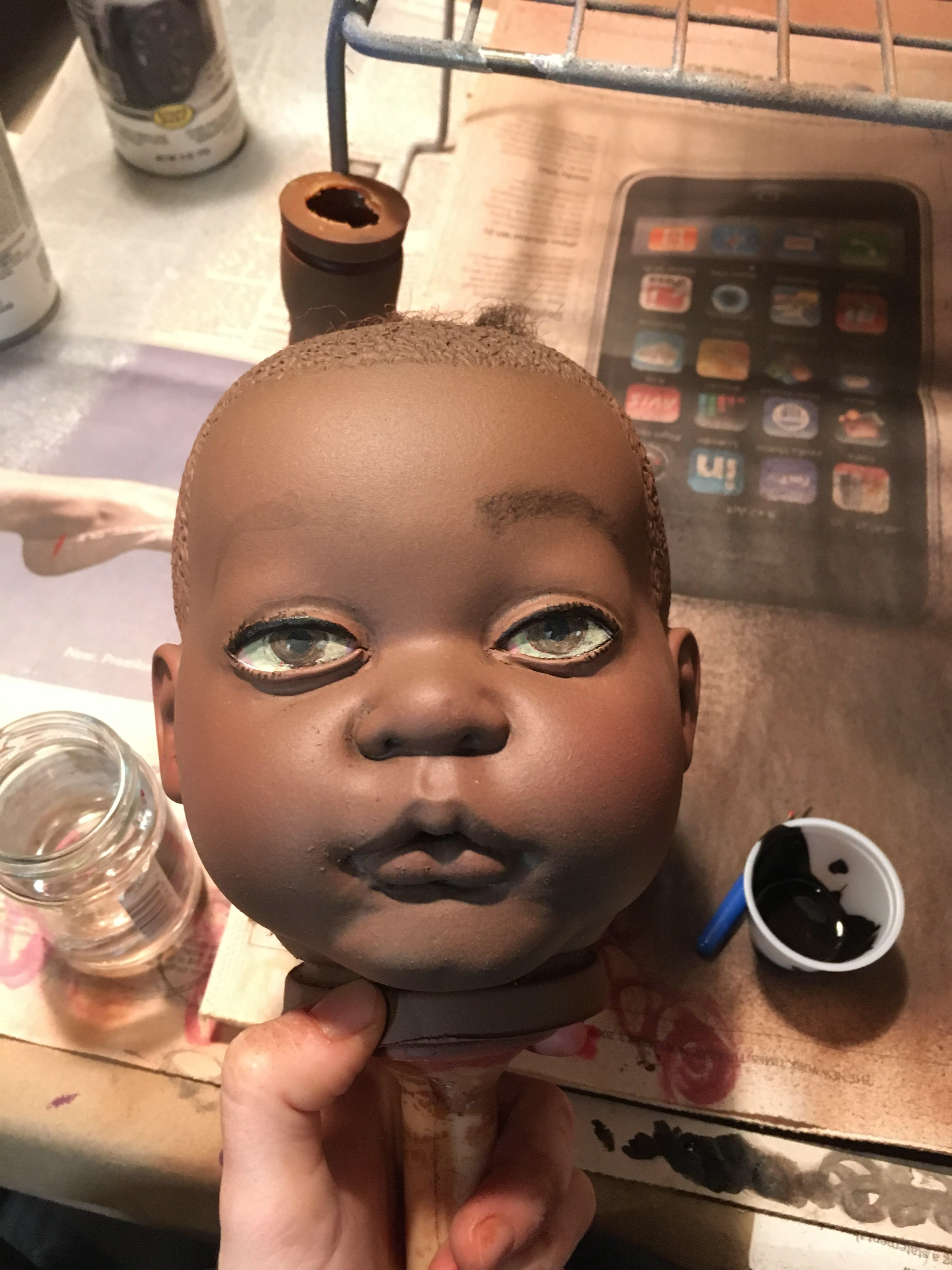 Adding facial details.