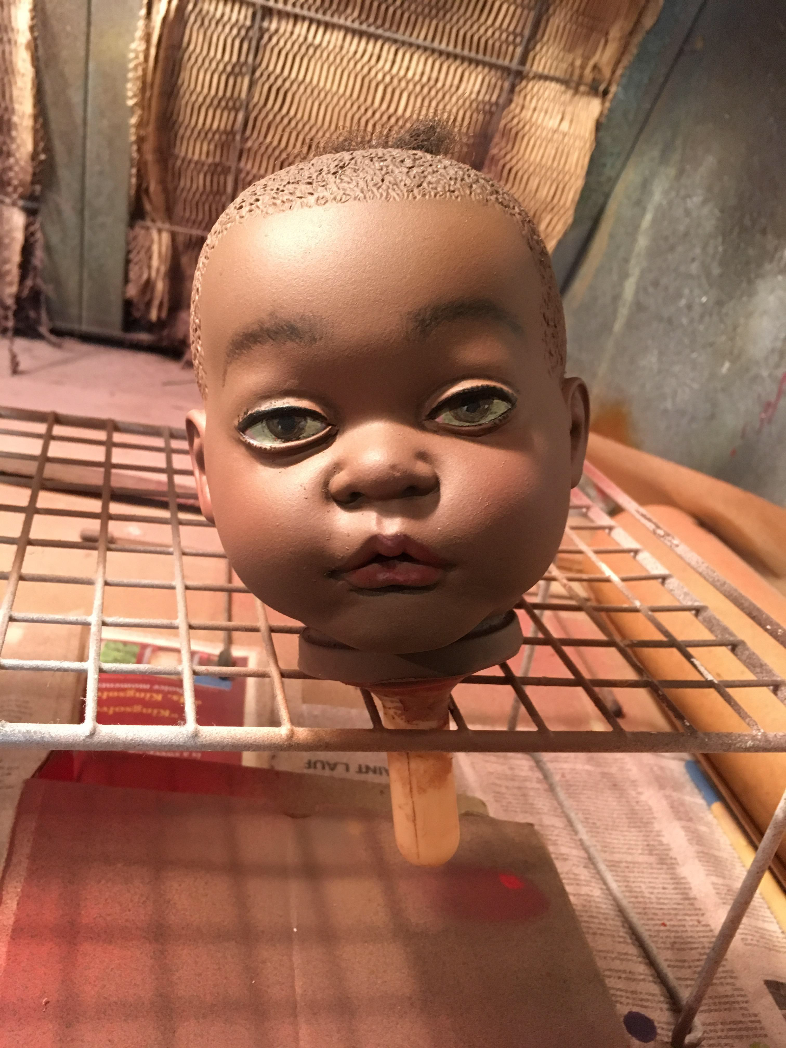 Adding facial details.