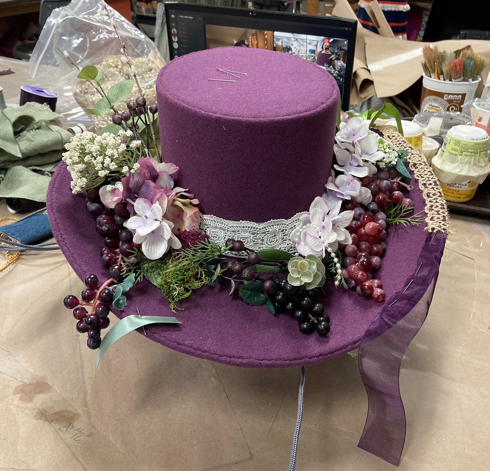 Testing out trims and floral placements.