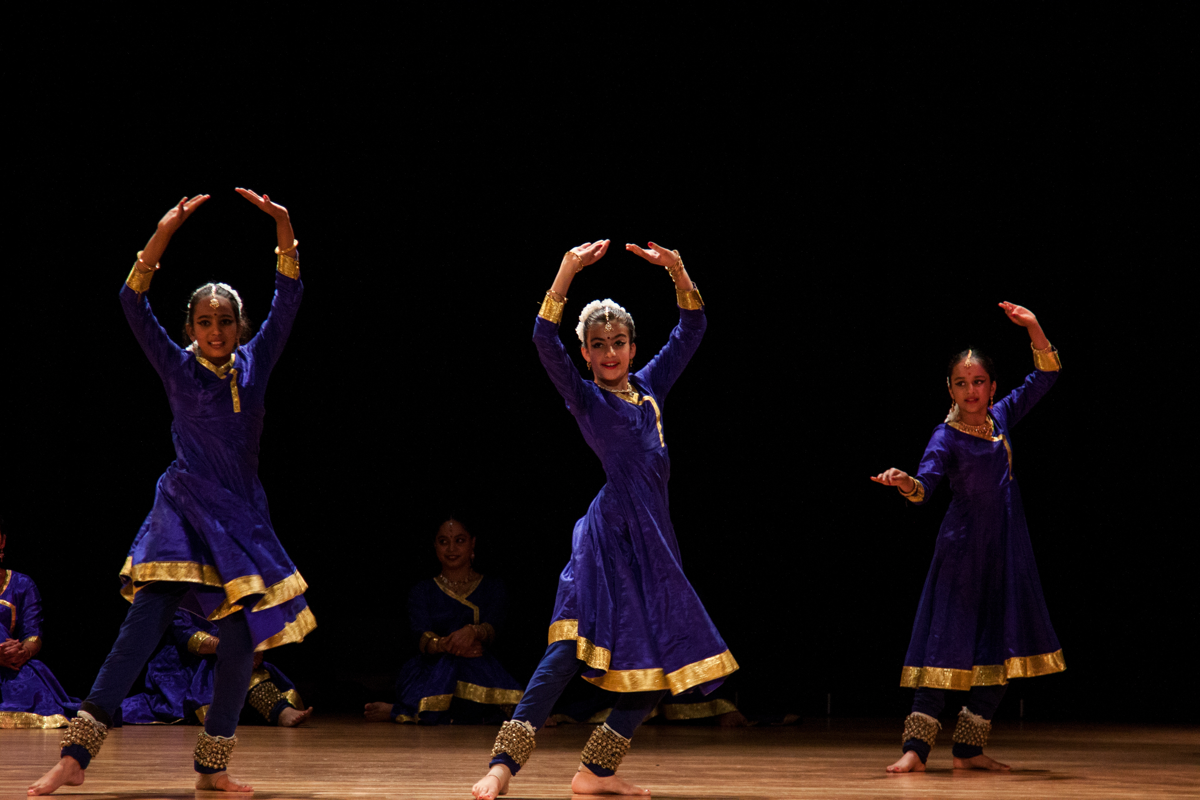 In a captivating display of youthful vigor, the budding Kathak dancers unveil their skillful artistry. Every movement tells a story, a testament to the timeless grace passed down through generations.