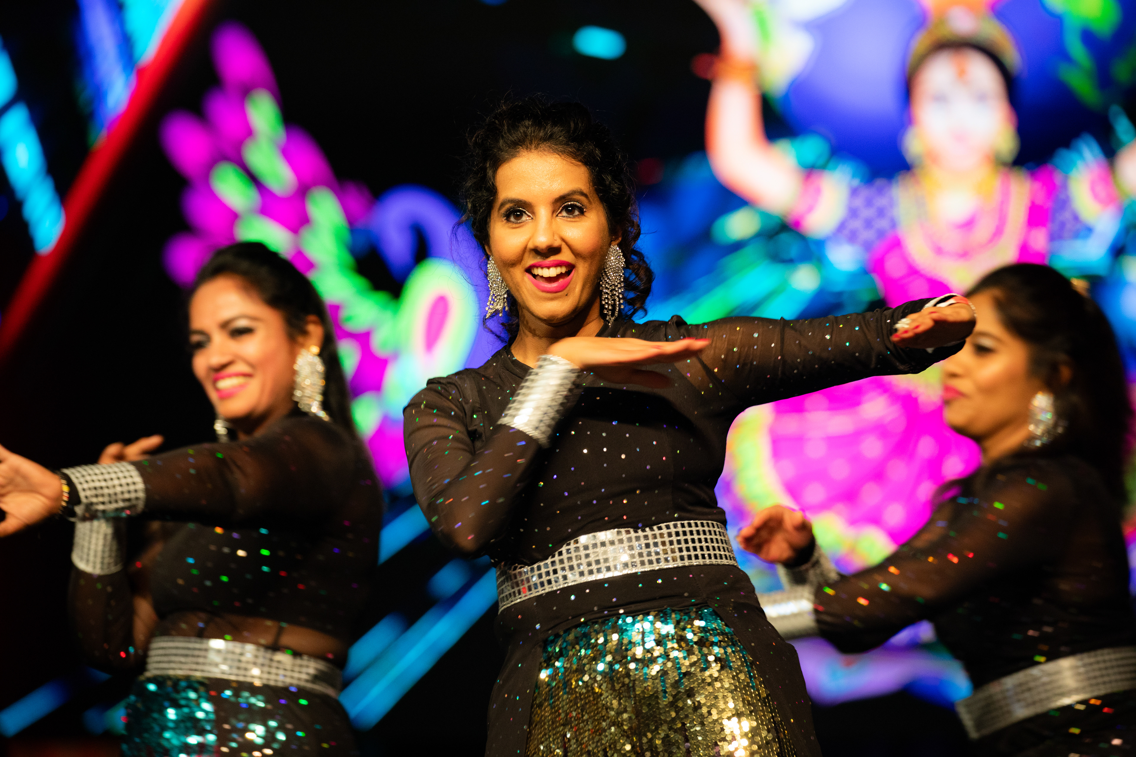 In the blink of a lens, a dynamic dance is encapsulated. Caught mid-motion, she transforms into a living work of art, a snapshot of passion and precision frozen in time.