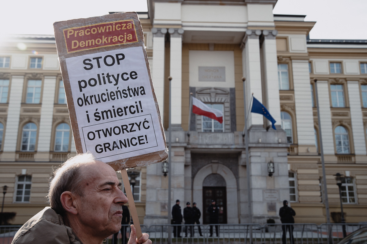 "Stop the politics of cruelty and death! Open the borders!"