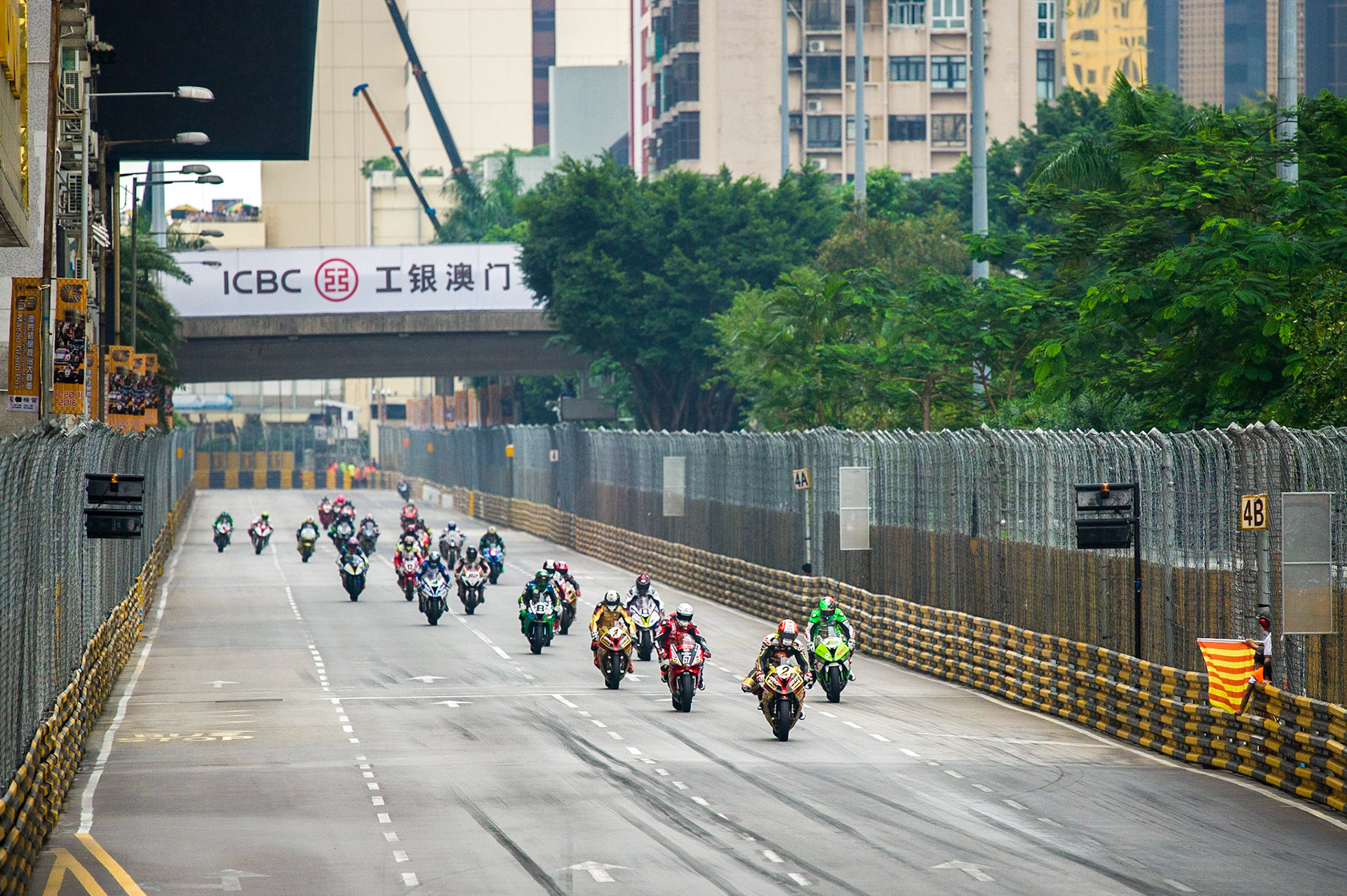 Michael Rutter (Bathams/SMT Racing BMW) leads the field into the Lisboa turn during the 2016 Macau Grand Prix. Image by Tony Goldsmith.