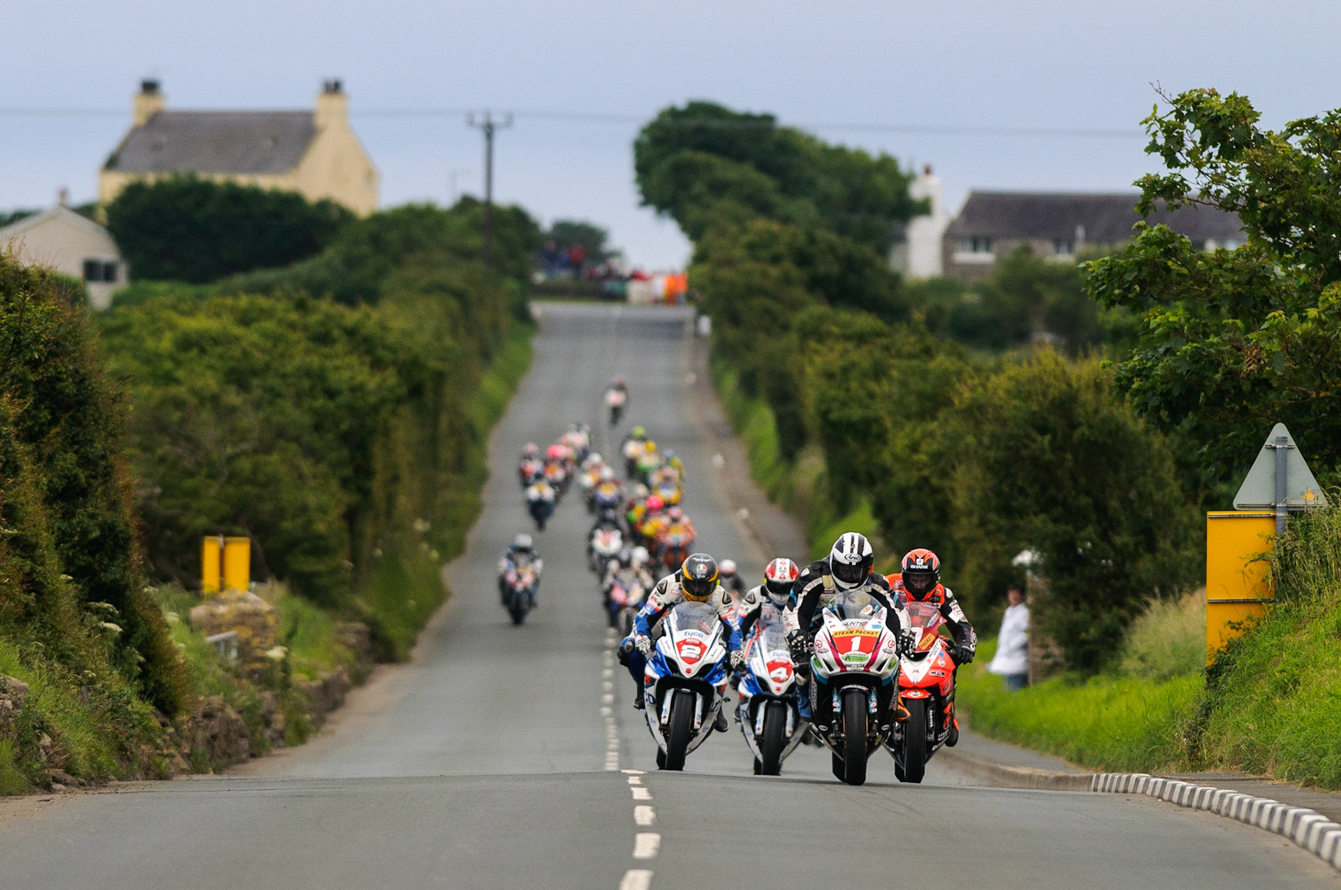 Micheal Dunlop leads the field into Iron Gate during one the Superbike races in 2012.